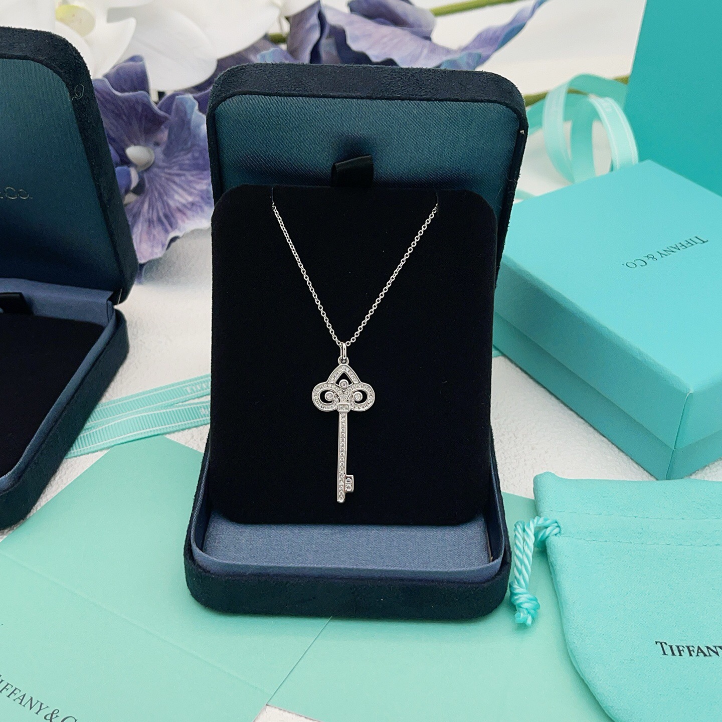 Tiffany Co Tiffany Keys Fleur de Lis Key Pendant necklace 18k white gold with diamond accents 18 inches