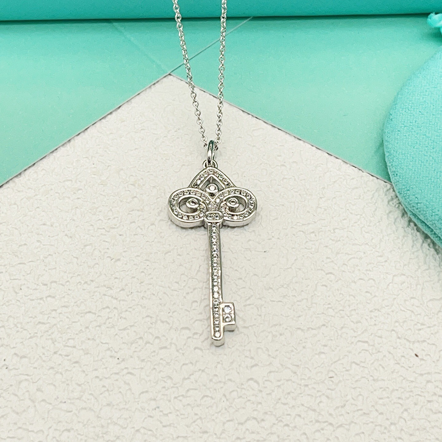 Tiffany Co Tiffany Keys Fleur de Lis Key Pendant necklace 18k white gold with diamond accents 18 inches