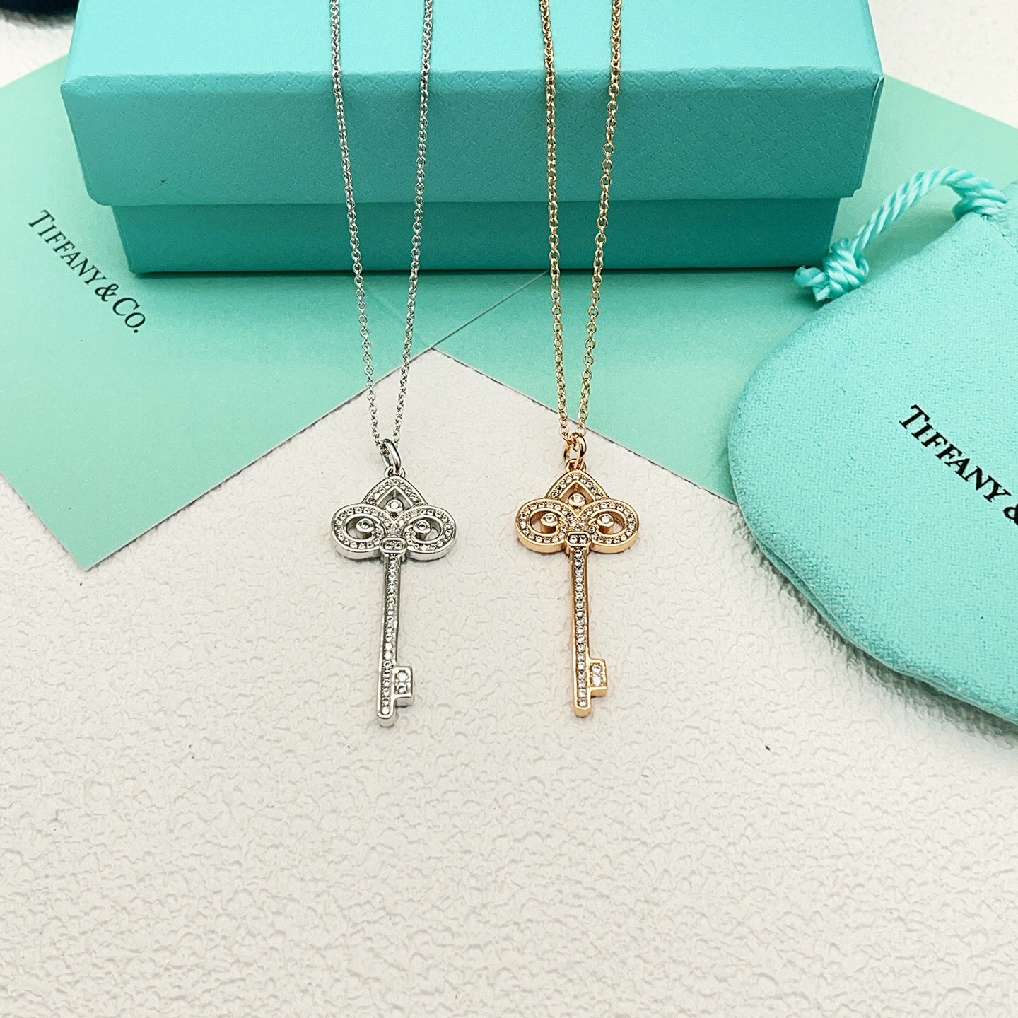 Tiffany Co Tiffany Keys Fleur de Lis Key Pendant necklace 18k white gold with diamond accents 18 inches