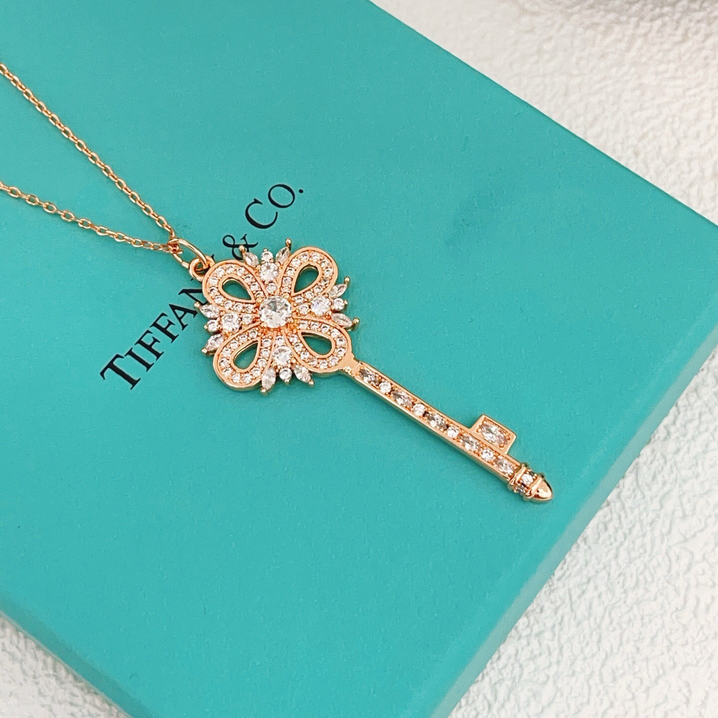 Tiffany Co Tiffany Keys Victorian Key Pendant necklace 18k rose gold with clear diamond simulants 18 inch chain