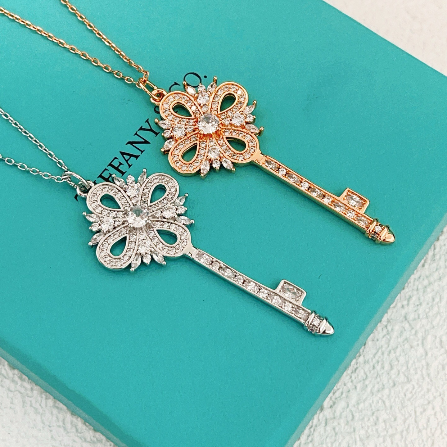 Tiffany Co Tiffany Keys Victorian Key Pendant necklace 18k rose gold with clear diamond simulants 18 inch chain