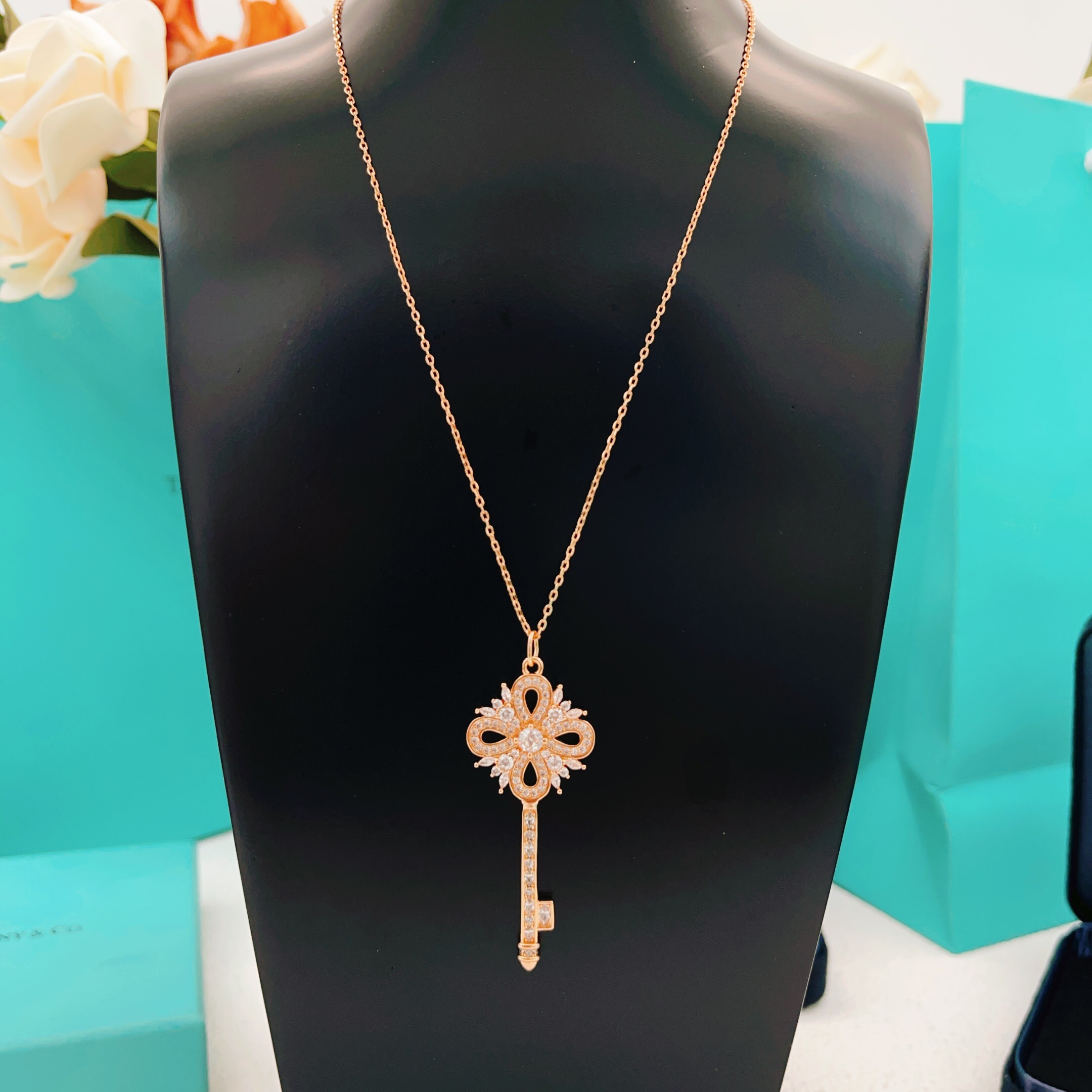 Tiffany Co Tiffany Keys Victorian Key Pendant necklace 18k rose gold with clear diamond simulants 18 inch chain