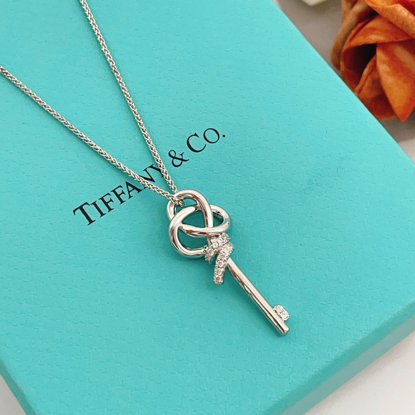 Tiffany Co Keys Knot Key Pendant necklace sterling silver with clear diamond accents 18 inches