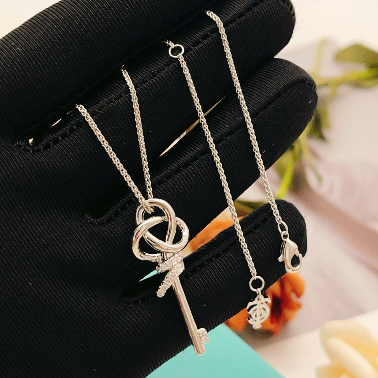 Tiffany Co Keys Knot Key Pendant necklace sterling silver with clear diamond accents 18 inches