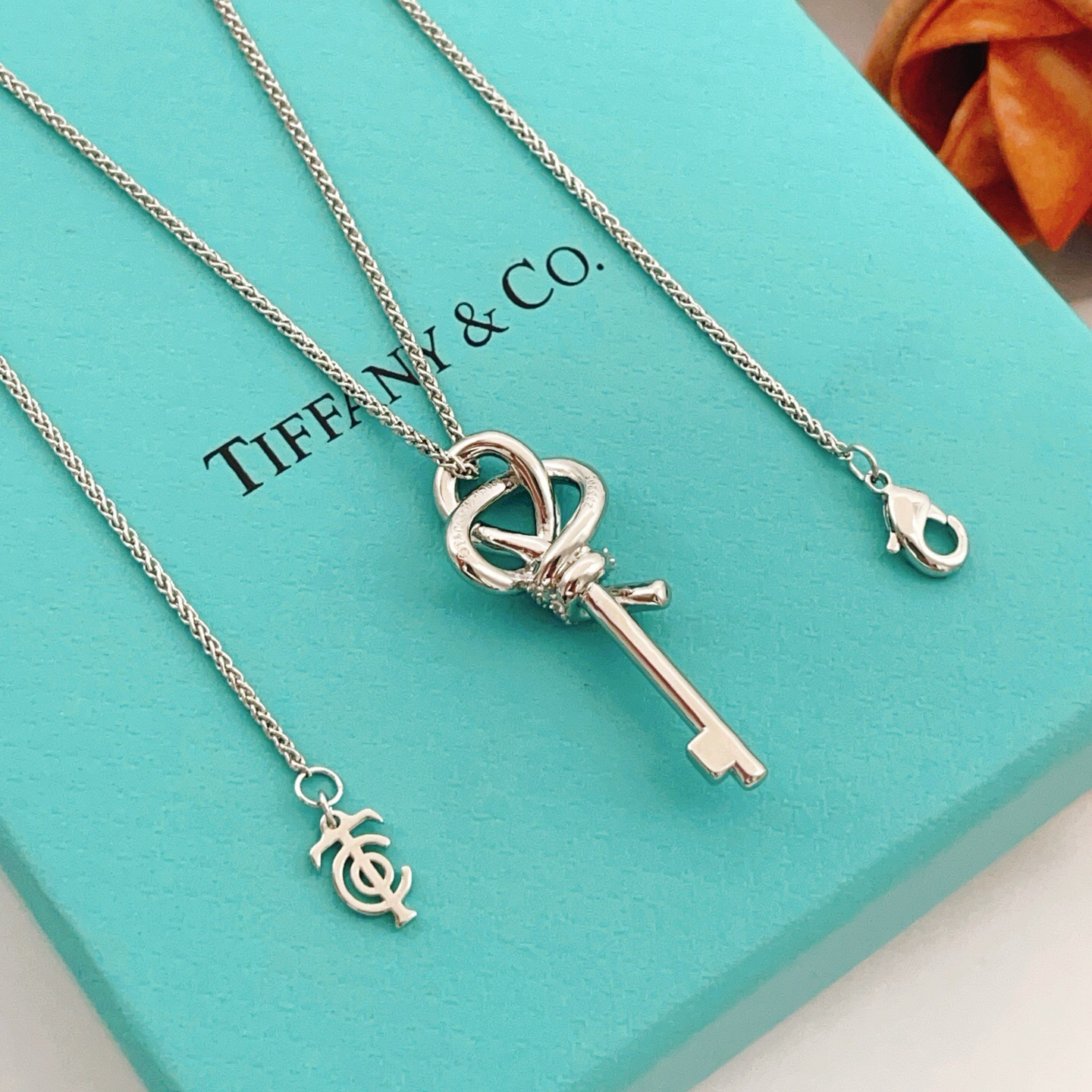 Tiffany Co Keys Knot Key Pendant necklace sterling silver with clear diamond accents 18 inches