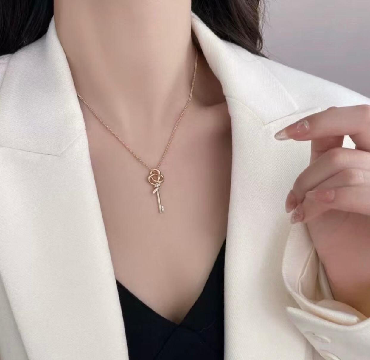 Tiffany Co Keys Knot Key Pendant necklace sterling silver with clear diamond accents 18 inches