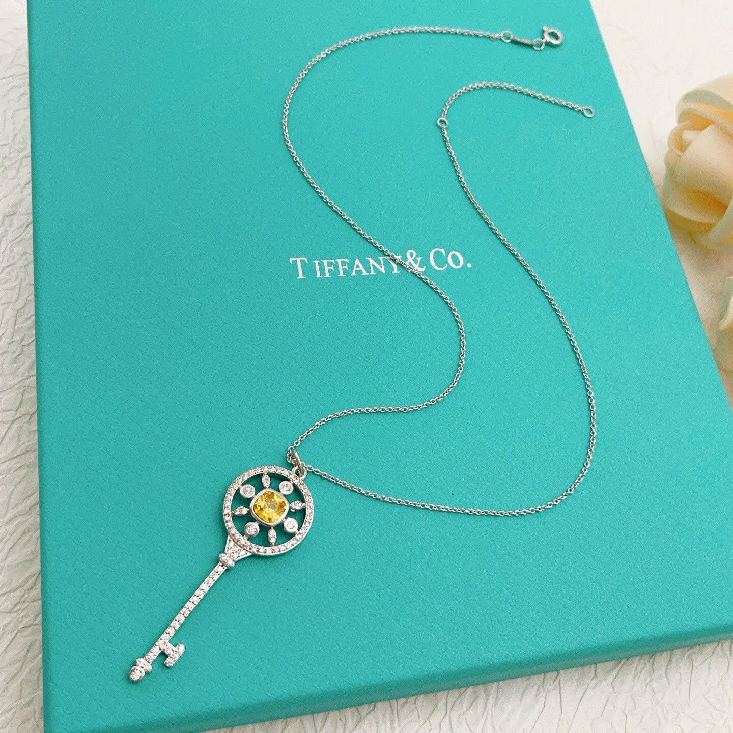 Tiffany Co Tiffany Keys necklace sterling silver with white diamond accents and yellow sapphire center stone 18 inches