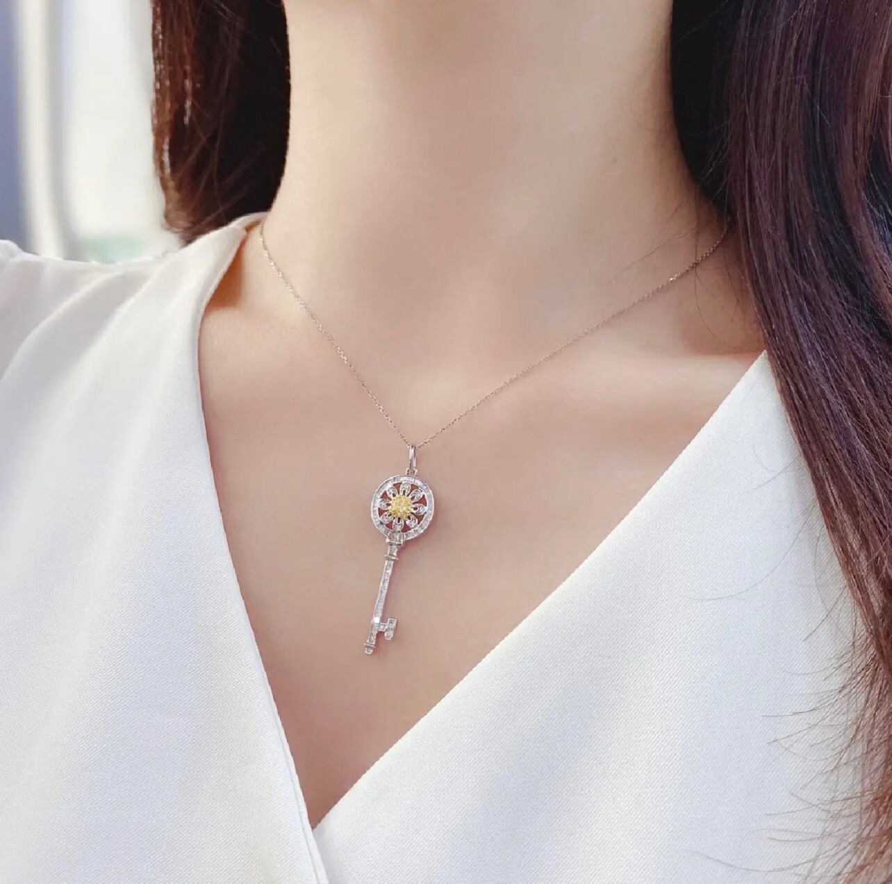 Tiffany Co Tiffany Keys necklace sterling silver with white diamond accents and yellow sapphire center stone 18 inches