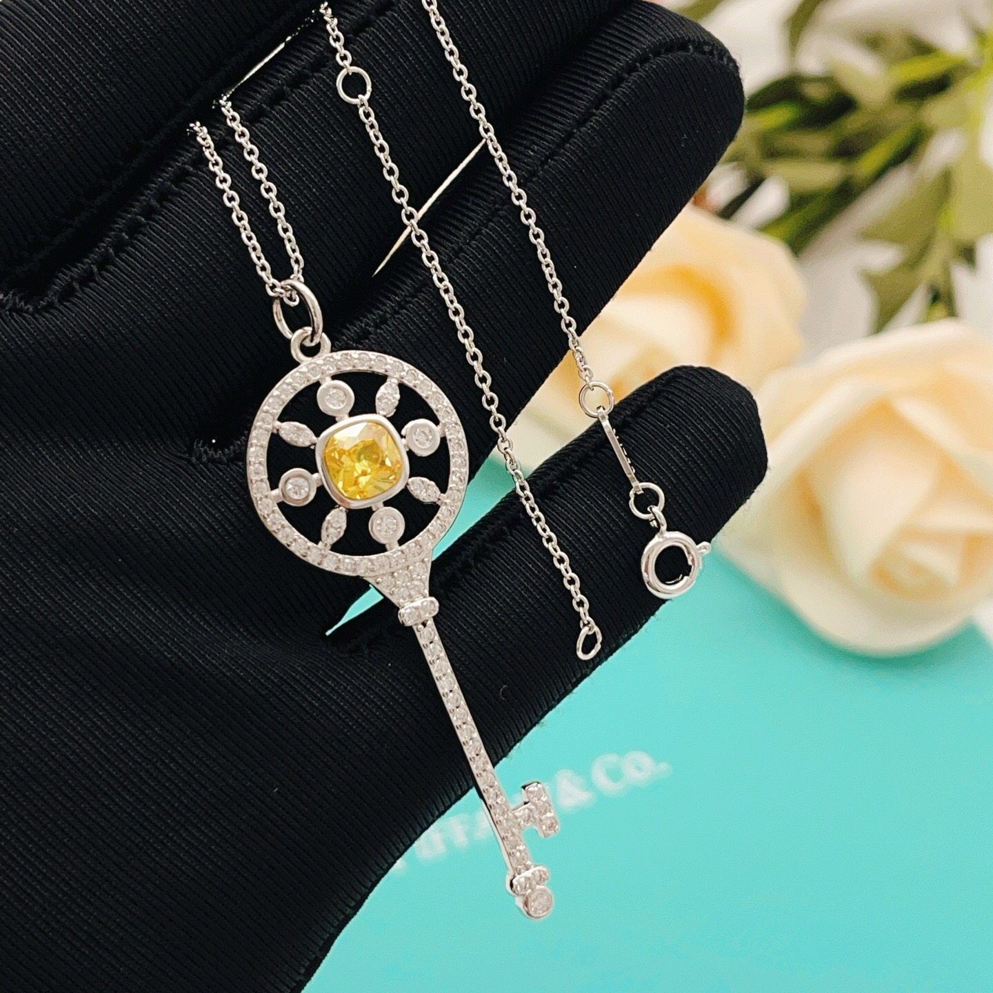 Tiffany Co Tiffany Keys necklace sterling silver with white diamond accents and yellow sapphire center stone 18 inches