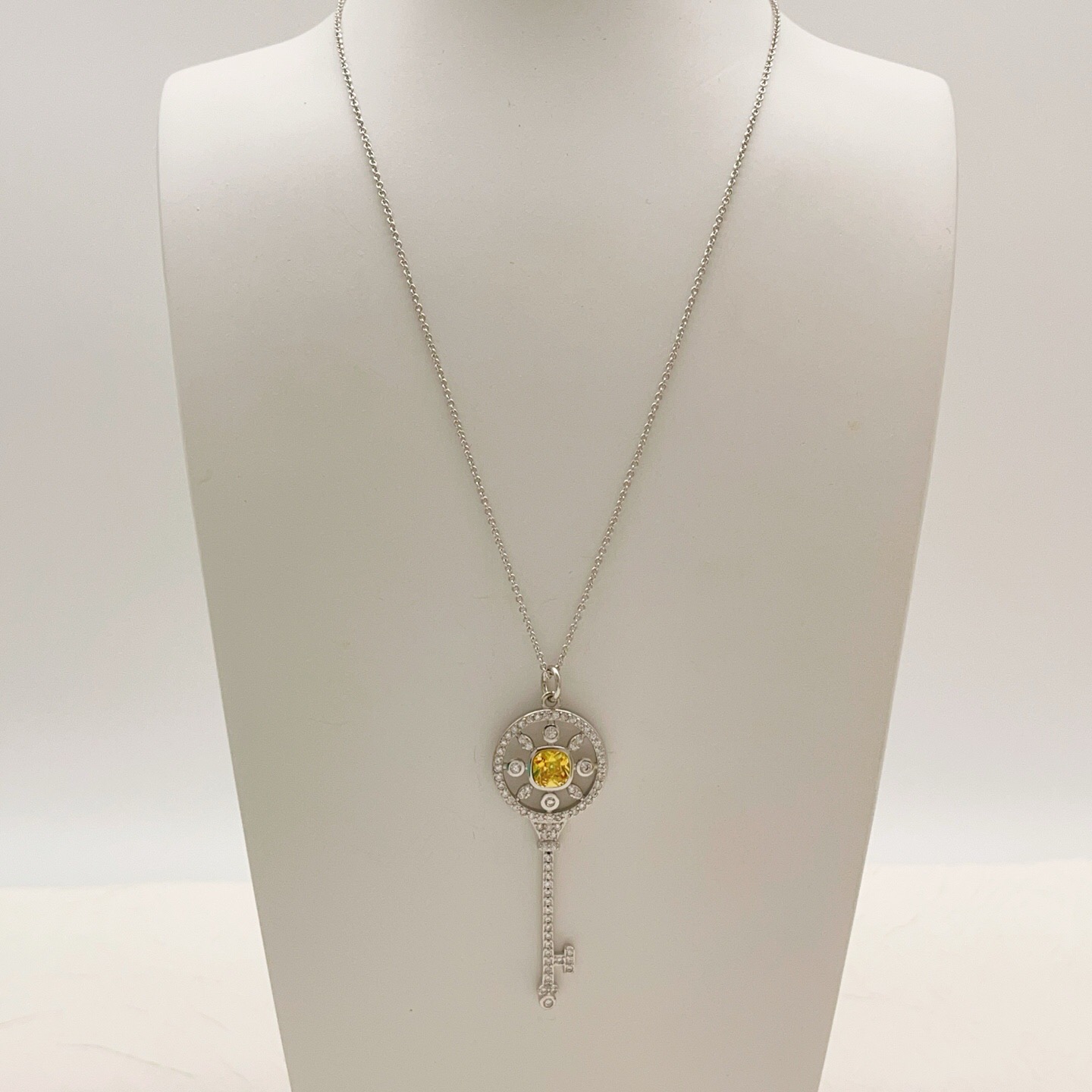 Tiffany Co Tiffany Keys necklace sterling silver with white diamond accents and yellow sapphire center stone 18 inches