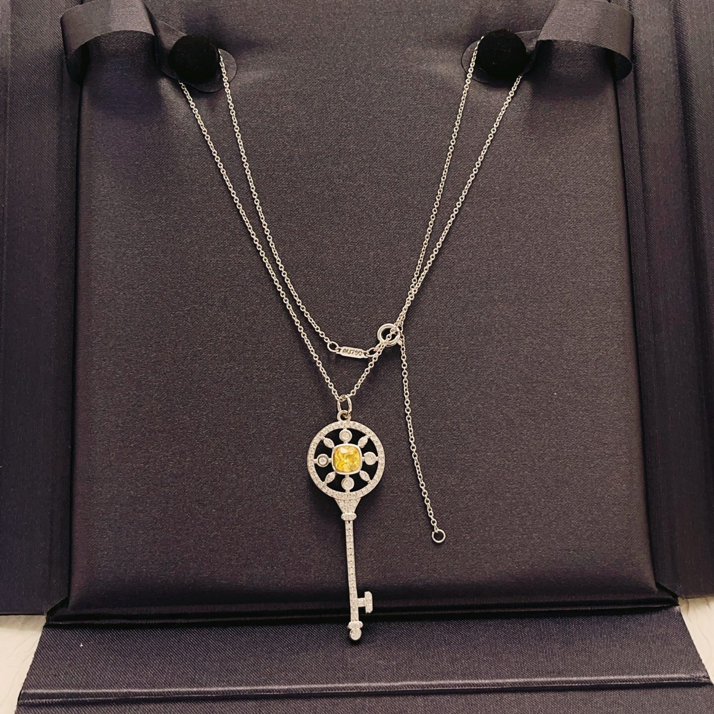 Tiffany Co Tiffany Keys necklace sterling silver with white diamond accents and yellow sapphire center stone 18 inches