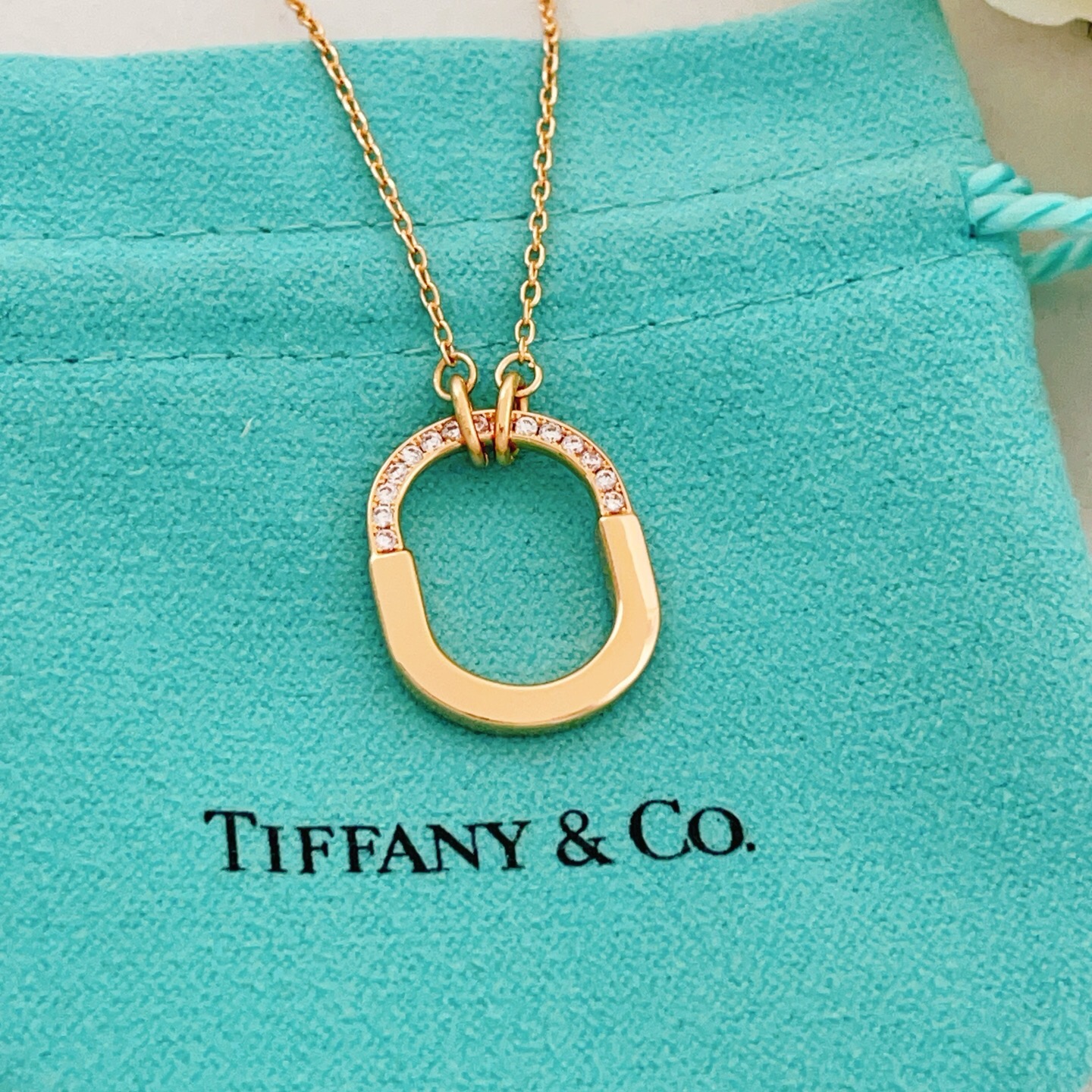 Tiffany Co Tiffany Lock necklace 18k yellow gold with clear diamond accents 18 inches