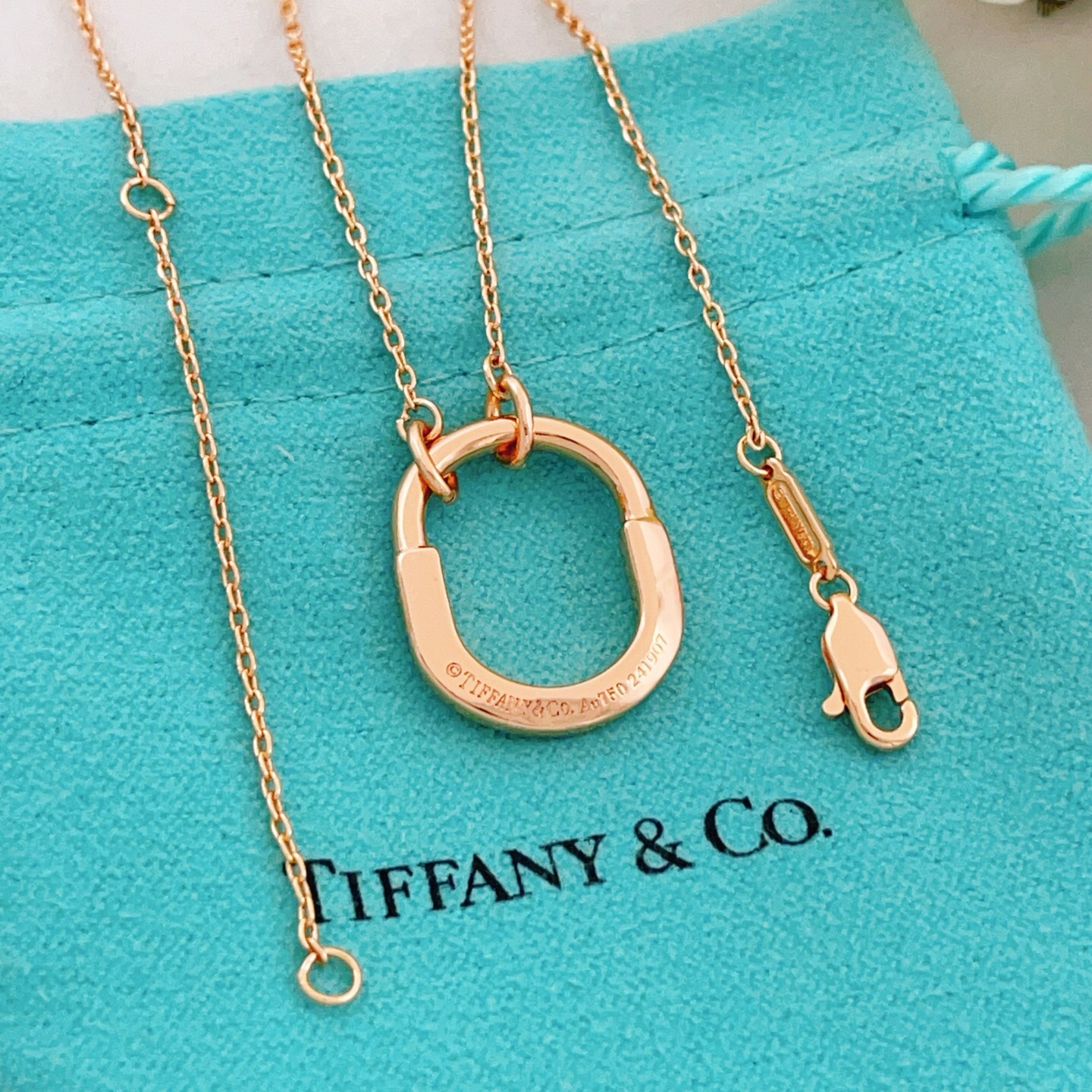 Tiffany Co Tiffany Lock necklace 18k yellow gold with clear diamond accents 18 inches
