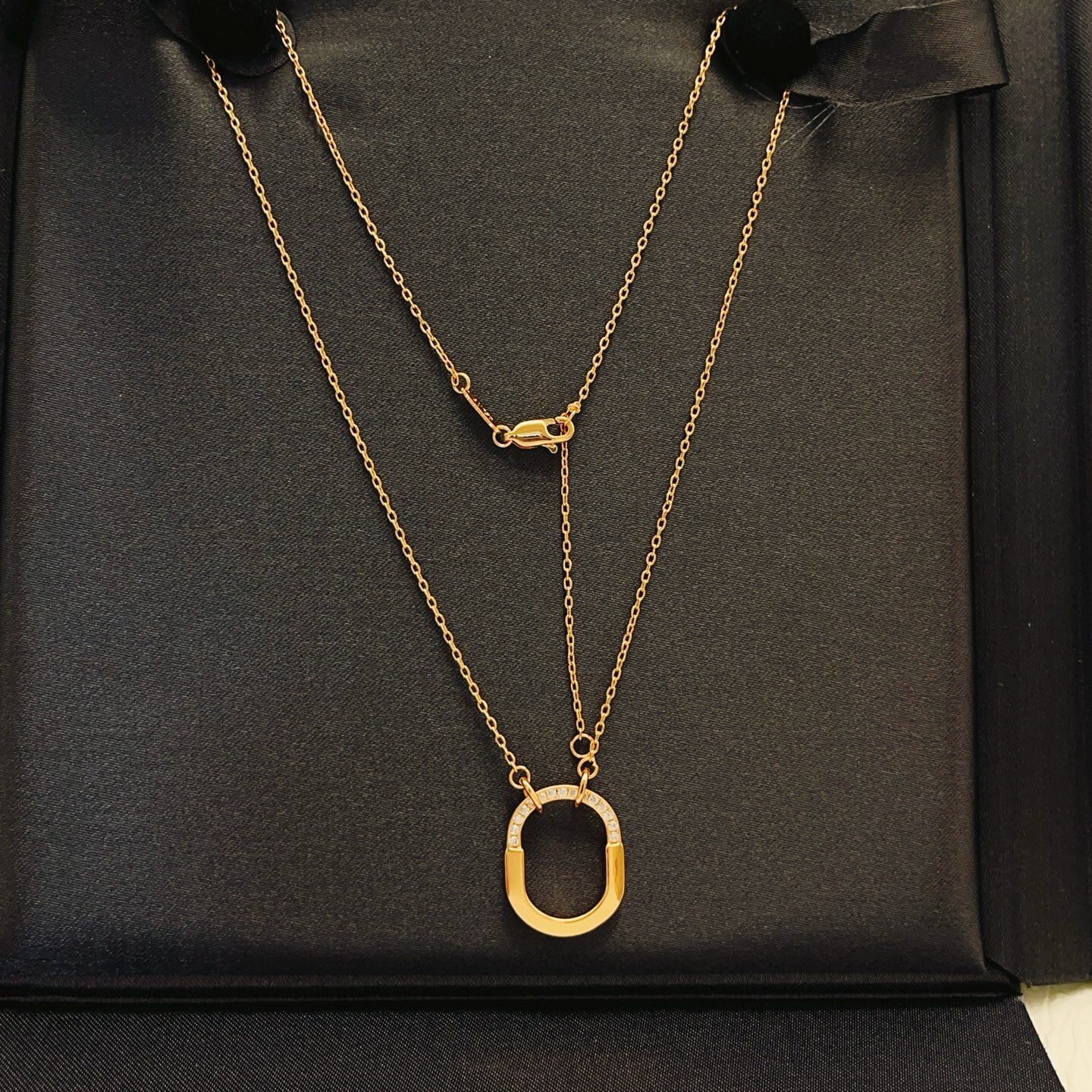 Tiffany Co Tiffany Lock necklace 18k yellow gold with clear diamond accents 18 inches