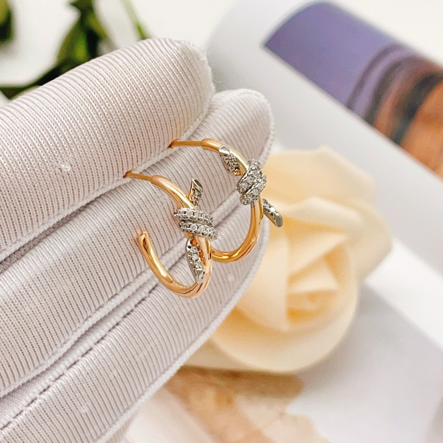 Tiffany Co Knot earrings 18k yellow gold with white diamond pave accents 15mm hoop diameter