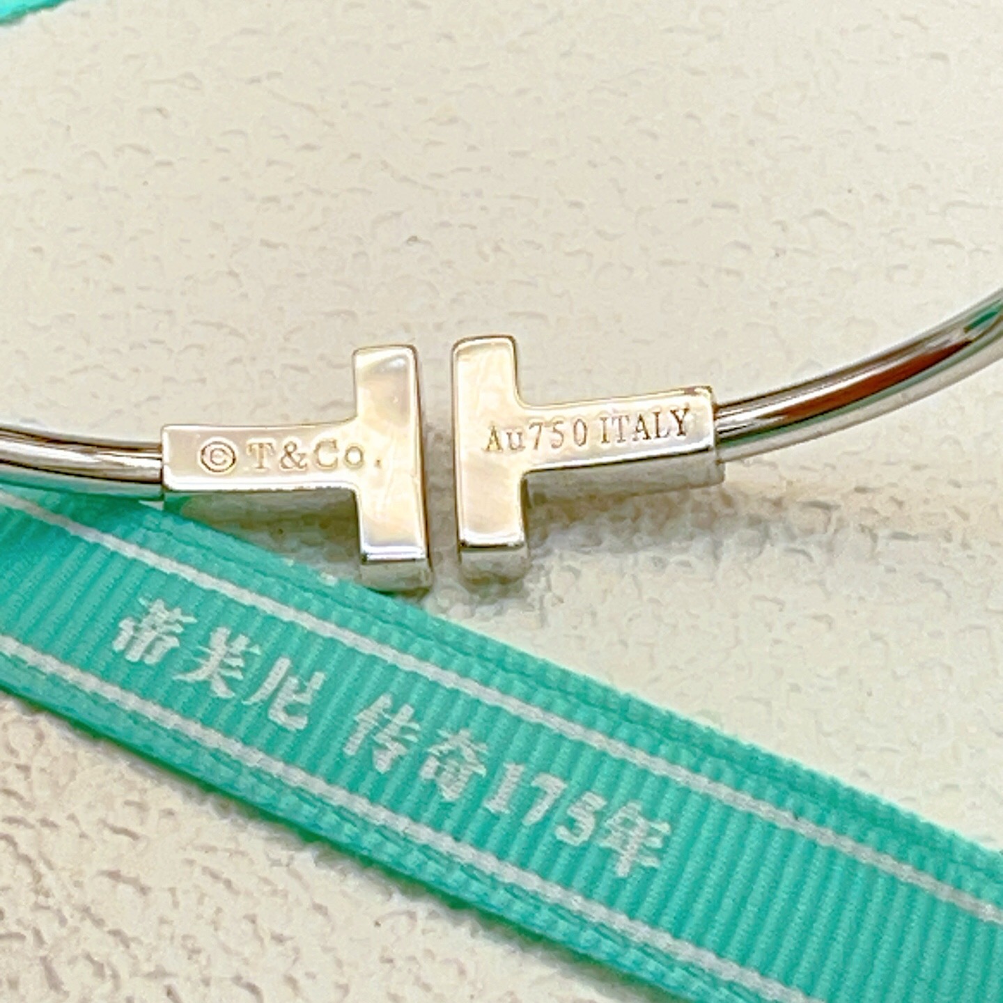 Tiffany Co T Wire bracelet 18k white gold with diamond and mother-of-pearl accents 17cm inner circumference