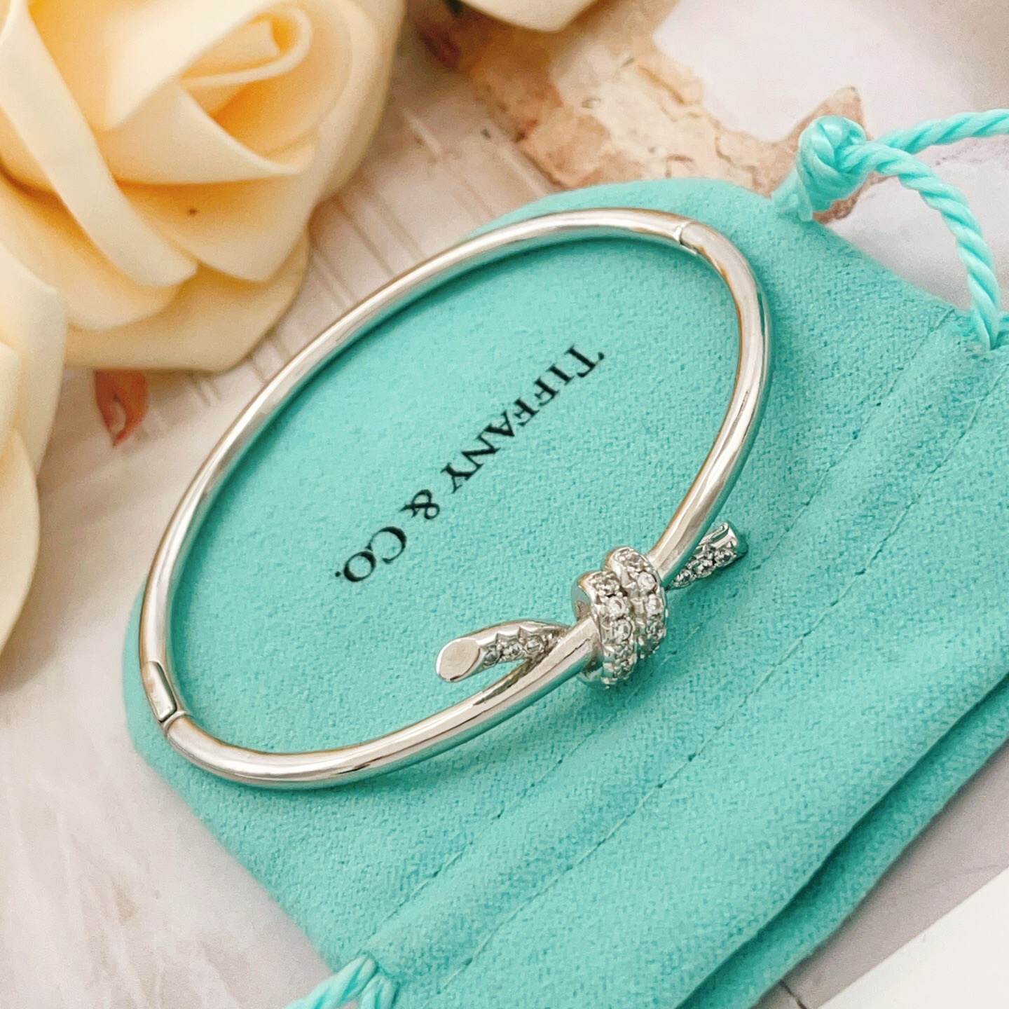 Tiffany Co Knot bracelet Silver-toned metal with clear diamond accents 17cm