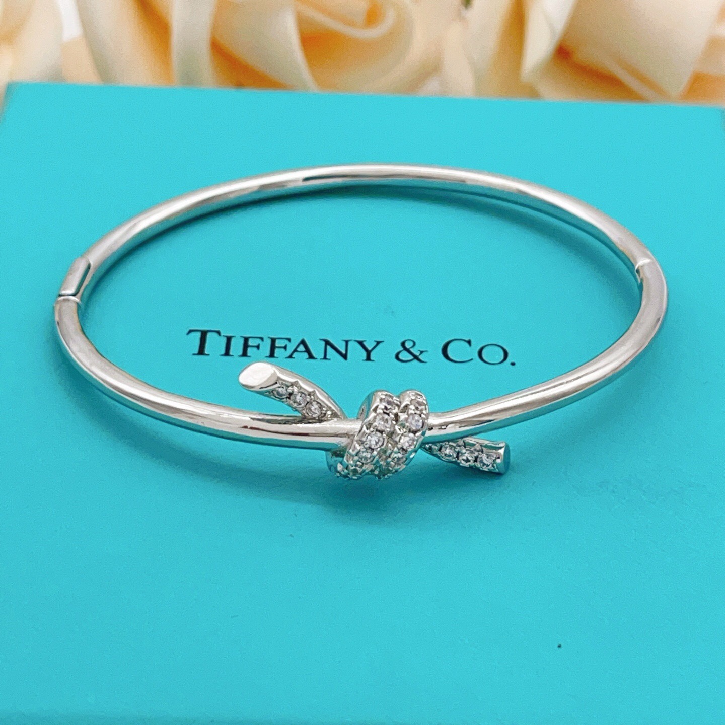 Tiffany Co Knot bracelet Silver-toned metal with clear diamond accents 17cm