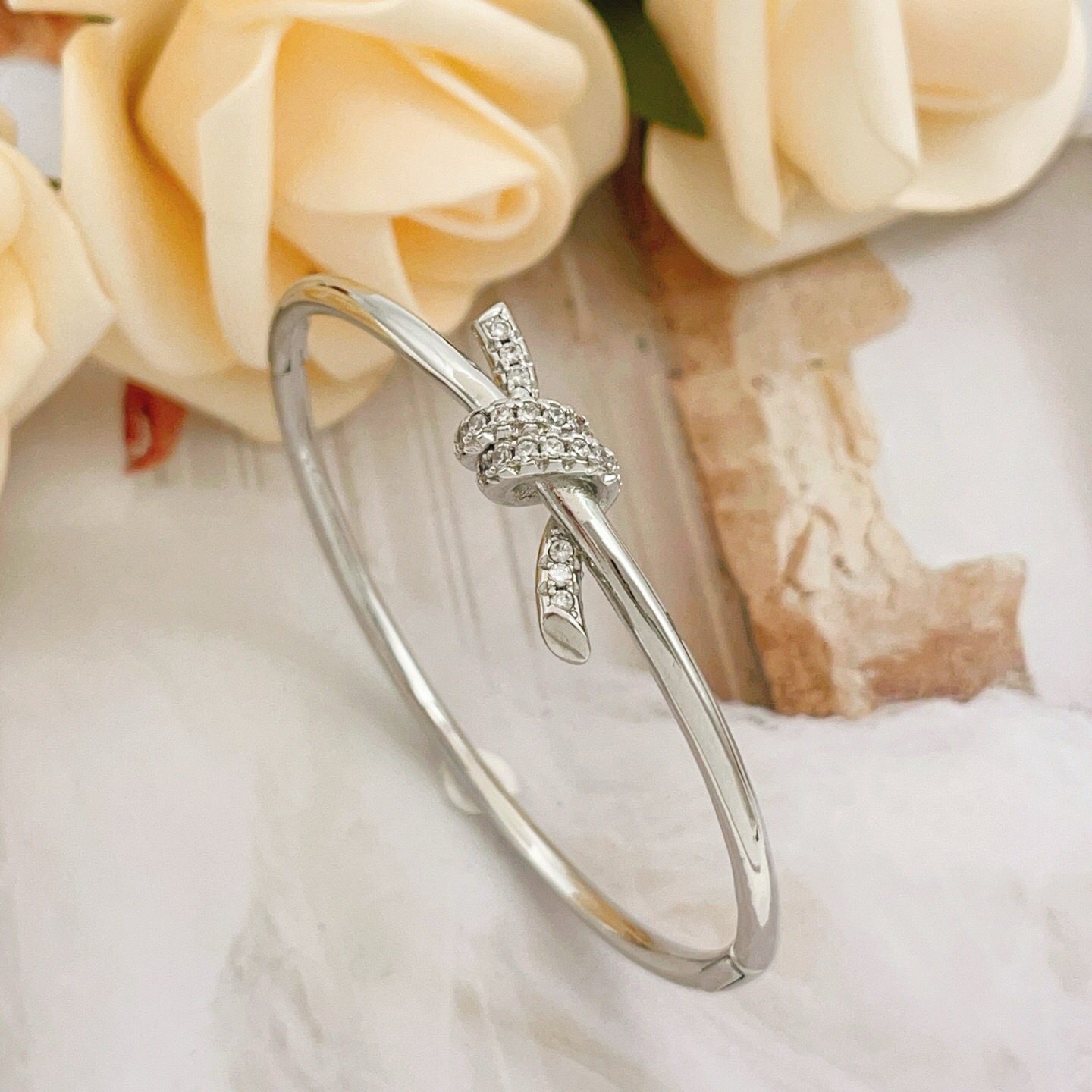 Tiffany Co Knot bracelet Silver-toned metal with clear diamond accents 17cm