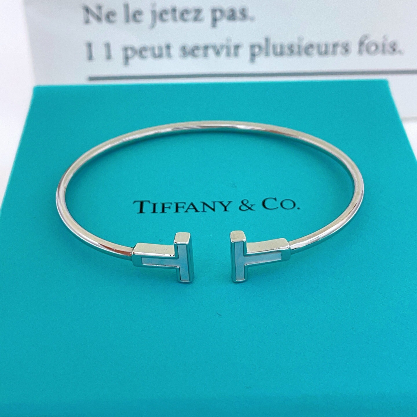 Tiffany Co T Wire bracelet Silver-toned metal with white mother-of-pearl inlay gold-toned metal with white mother-of-pearl inlay gold-toned metal with pink mother-of-pearl inlay 17cm inner circumference