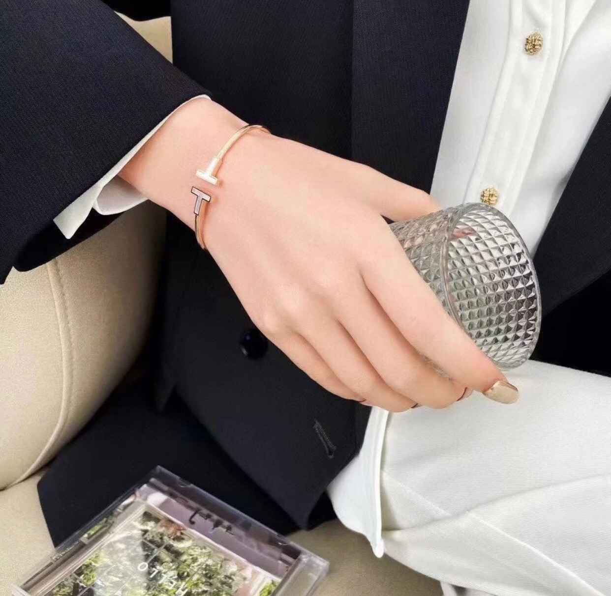 Tiffany T Wire bracelet Available in yellow gold with white mother-of-pearl inlay silver with white enamel inlay and rose gold with pink mother-of-pearl inlay 17cm inner circumference