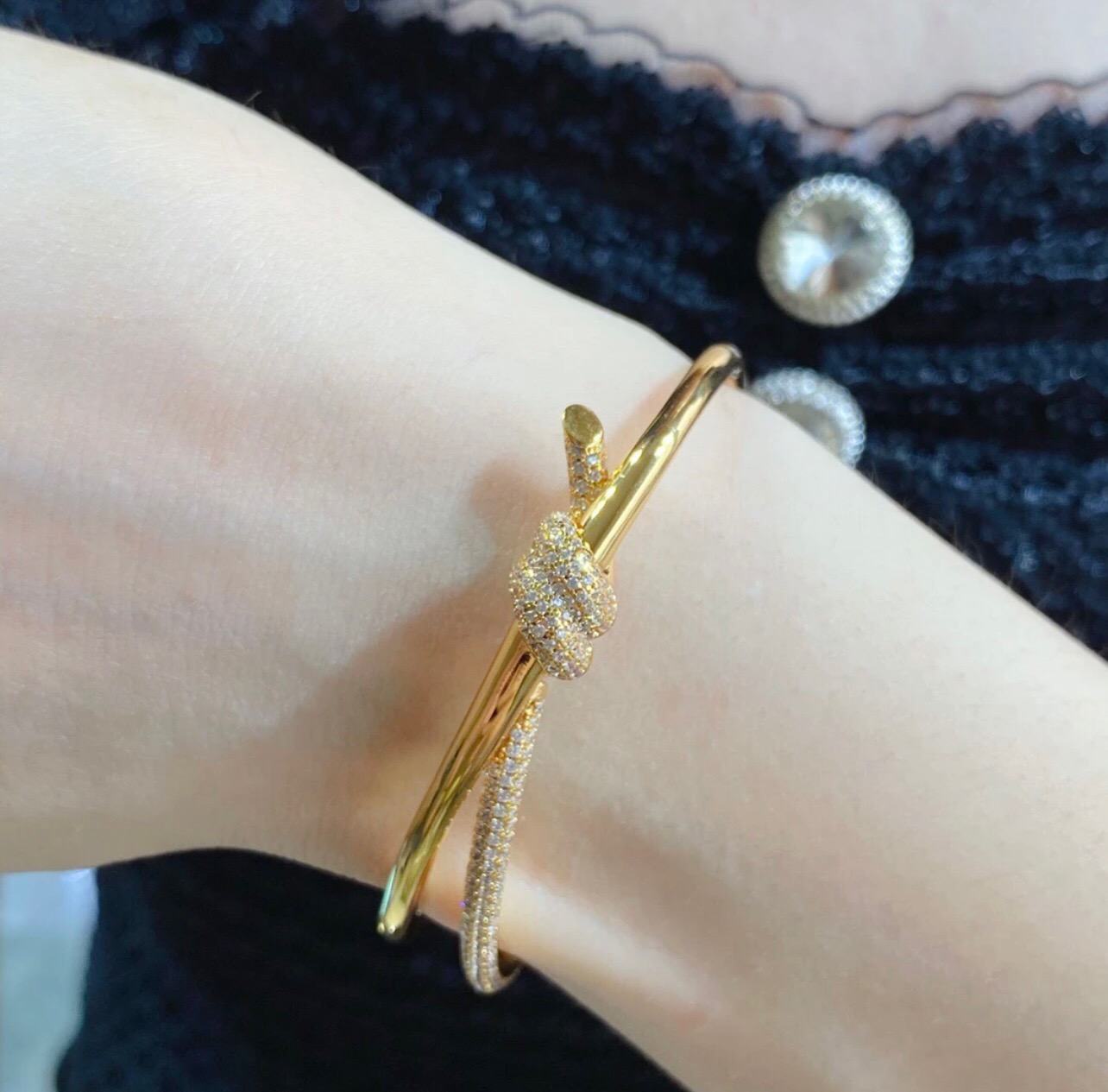 Tiffany Co Knot bracelet yellow gold metal with clear diamond pave accents 17cm inner circumference