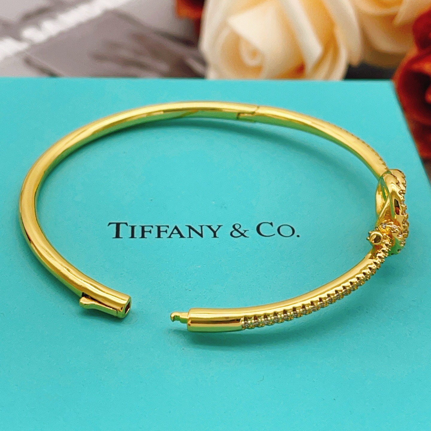 Tiffany Co Knot bracelet yellow gold with clear diamond accents 17cm inner circumference