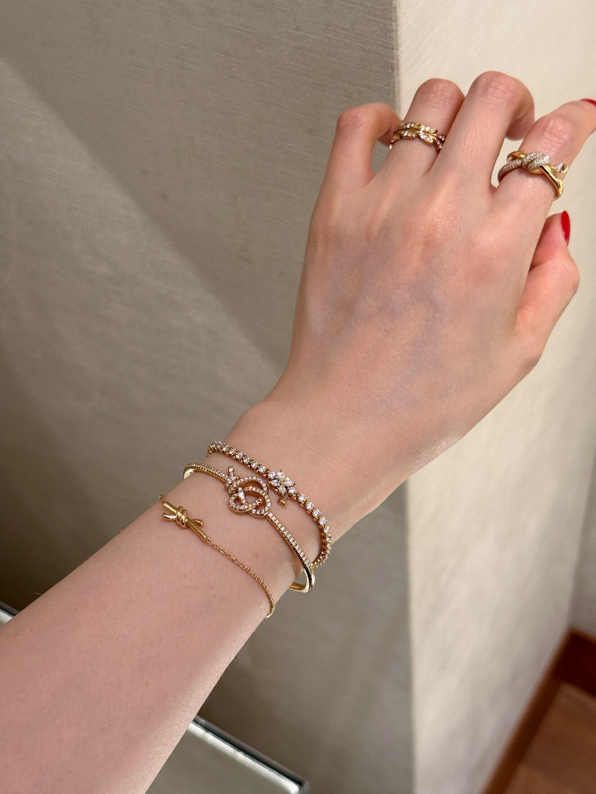 Tiffany Co Knot bracelet yellow gold with clear diamond accents 17cm inner circumference
