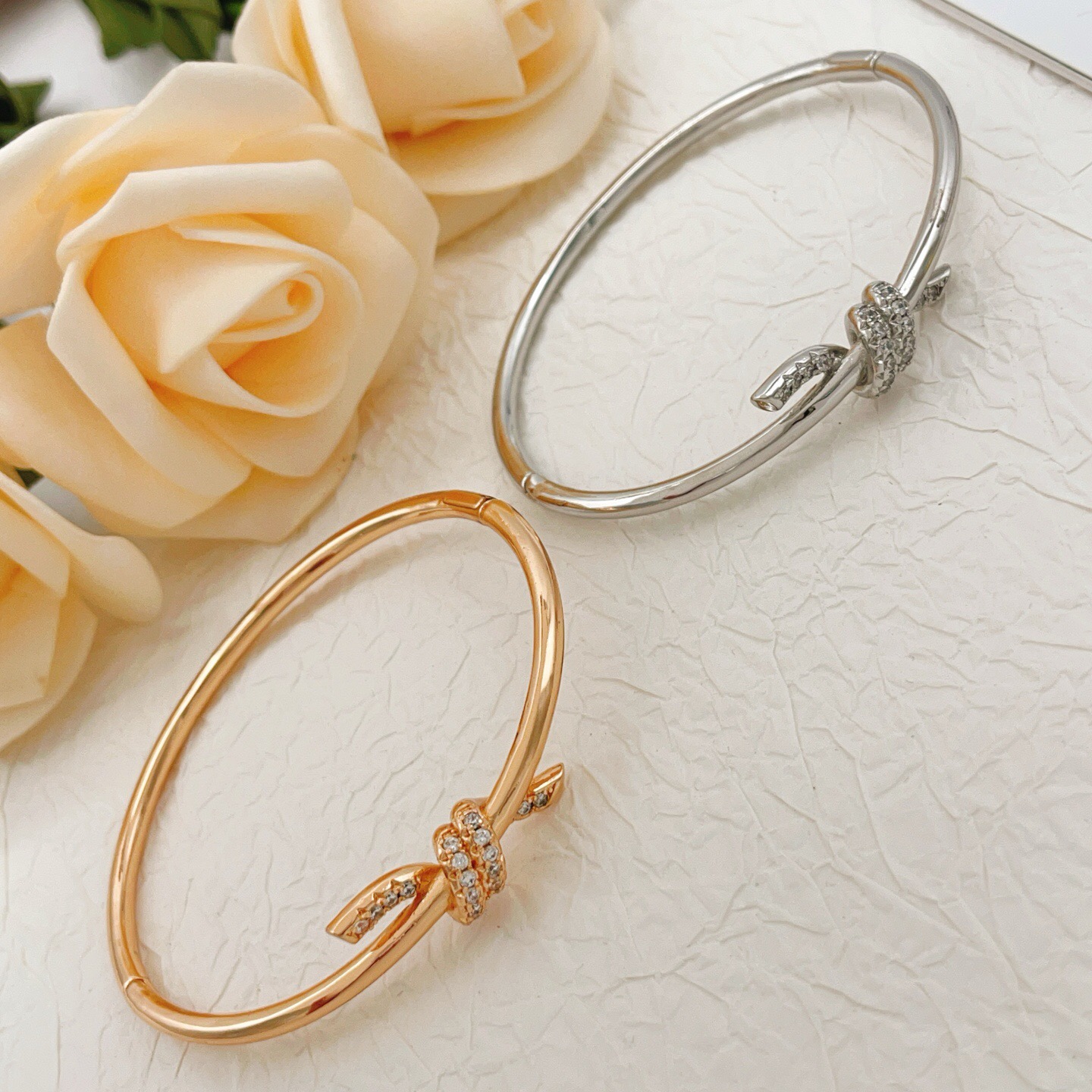 Tiffany Co Knot bracelet 18k rose gold with clear diamond accents 17cm inner circumference