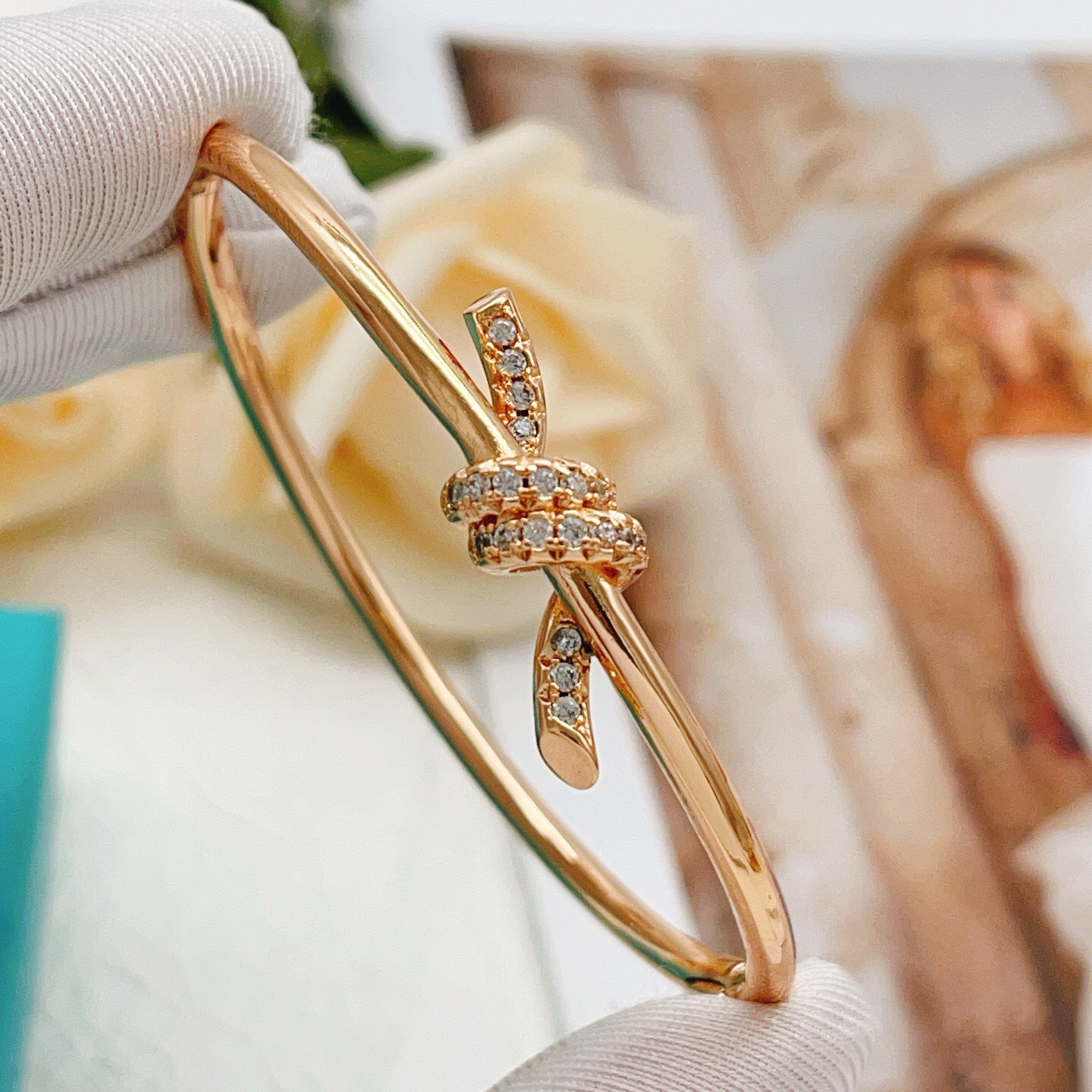 Tiffany Co Knot bracelet 18k rose gold with clear diamond accents 17cm inner circumference