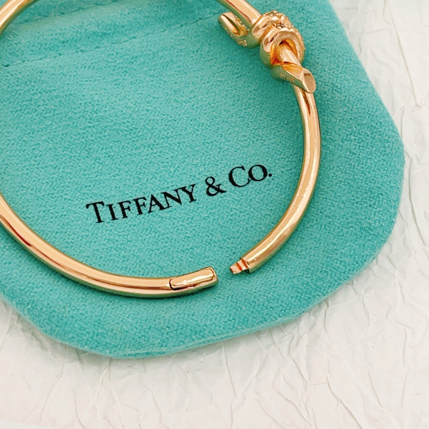 Tiffany Co Knot bracelet 18k rose gold with clear diamond accents 17cm inner circumference