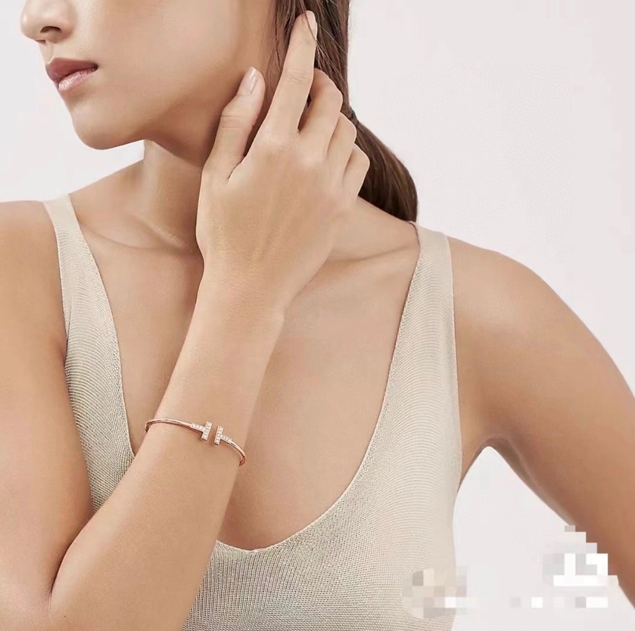 Tiffany T Wire bracelet 18k rose gold with clear diamond accents 18k yellow gold with clear diamond accents sterling silver with clear diamond accents 17cm inner circumference