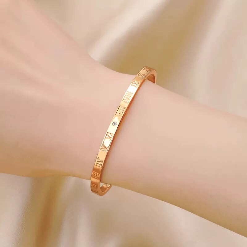 Bvlgari Bvlgari B zero1 Logo Bangle bracelet rose gold with clear diamond accent one size fits all