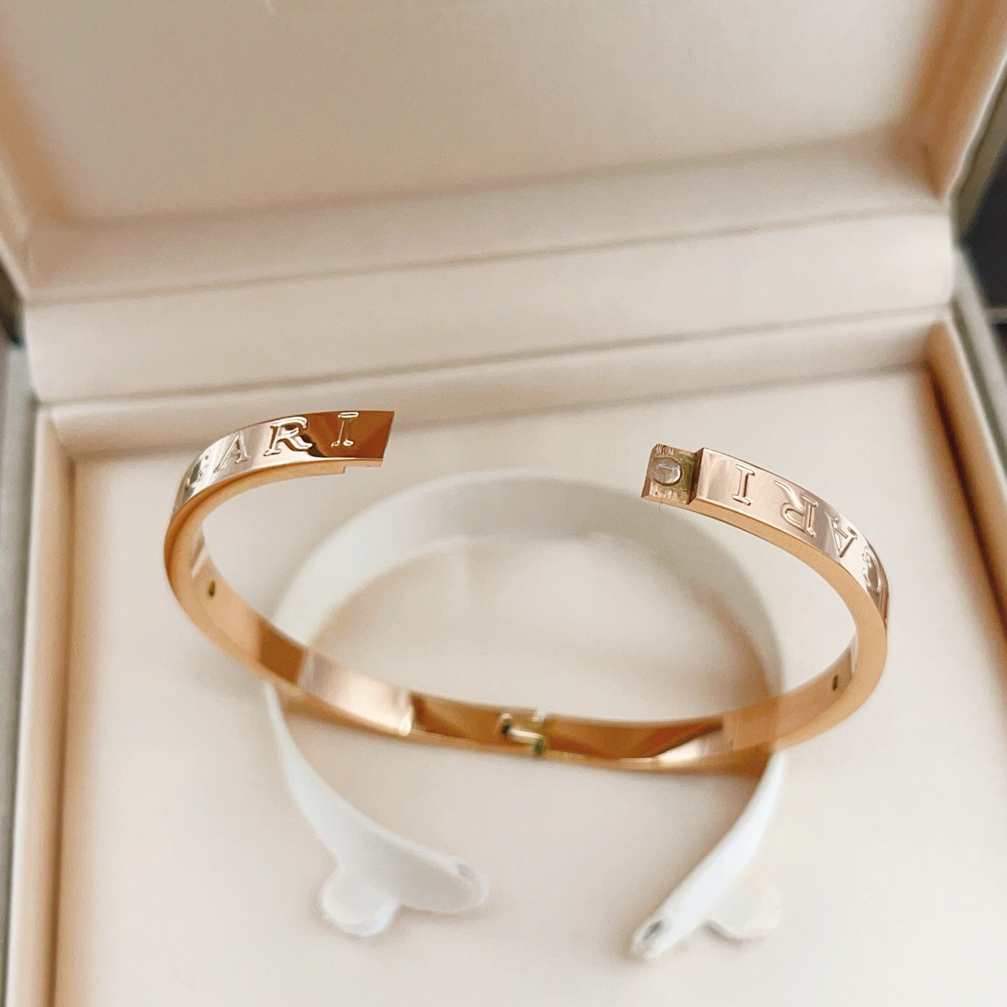 Bvlgari Bvlgari B zero1 Logo Bangle bracelet rose gold with clear diamond accent one size fits all