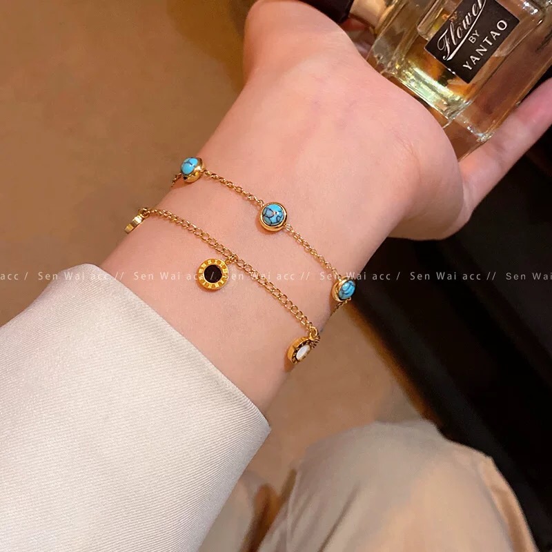 Bvlgari Bvlgari bracelet rose gold metal with red green malachite blue and white mother-of-pearl stone accents 18cm