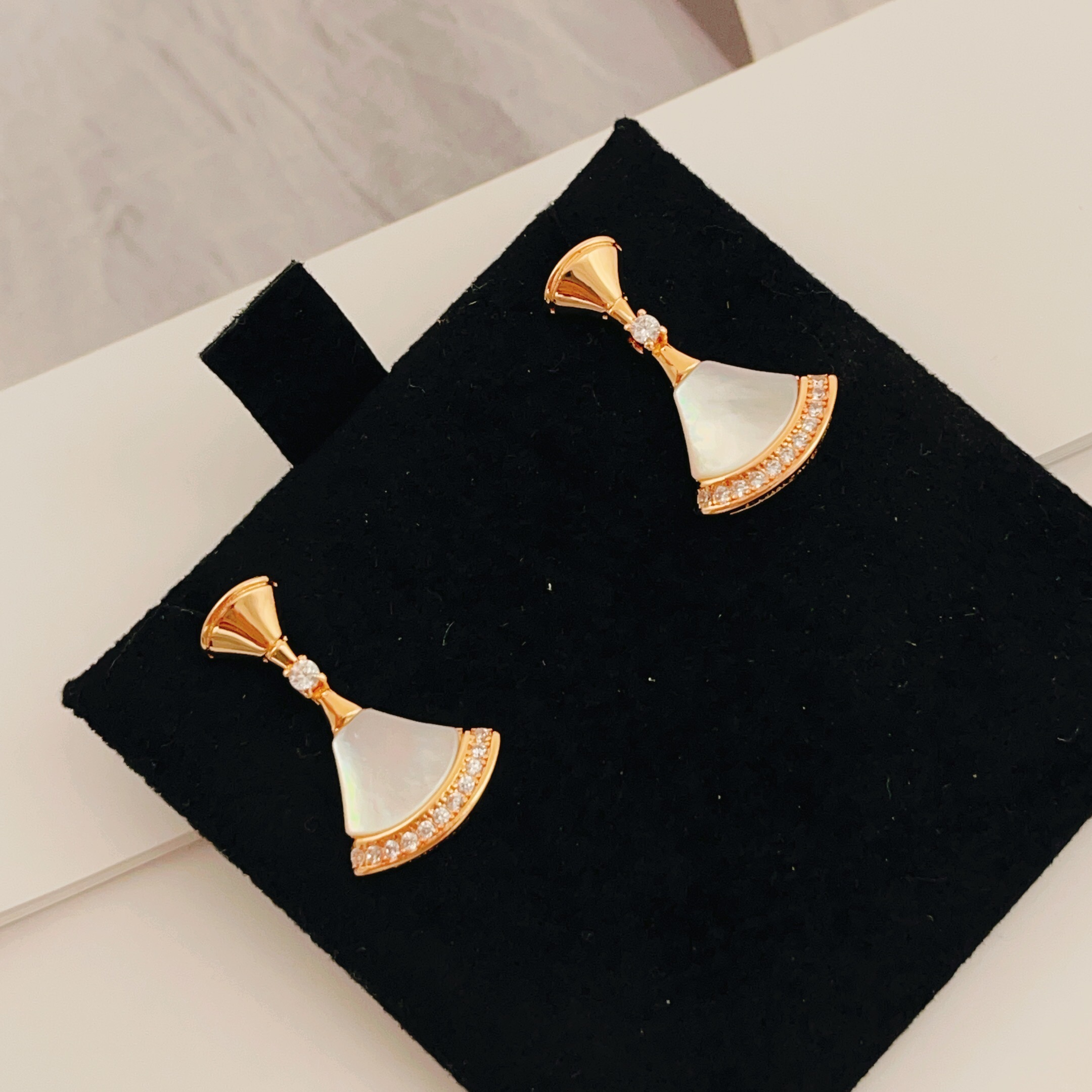 Bvlgari Divas Dream earrings rose gold metal with white mother-of-pearl and clear diamond accents 2 2cm drop length