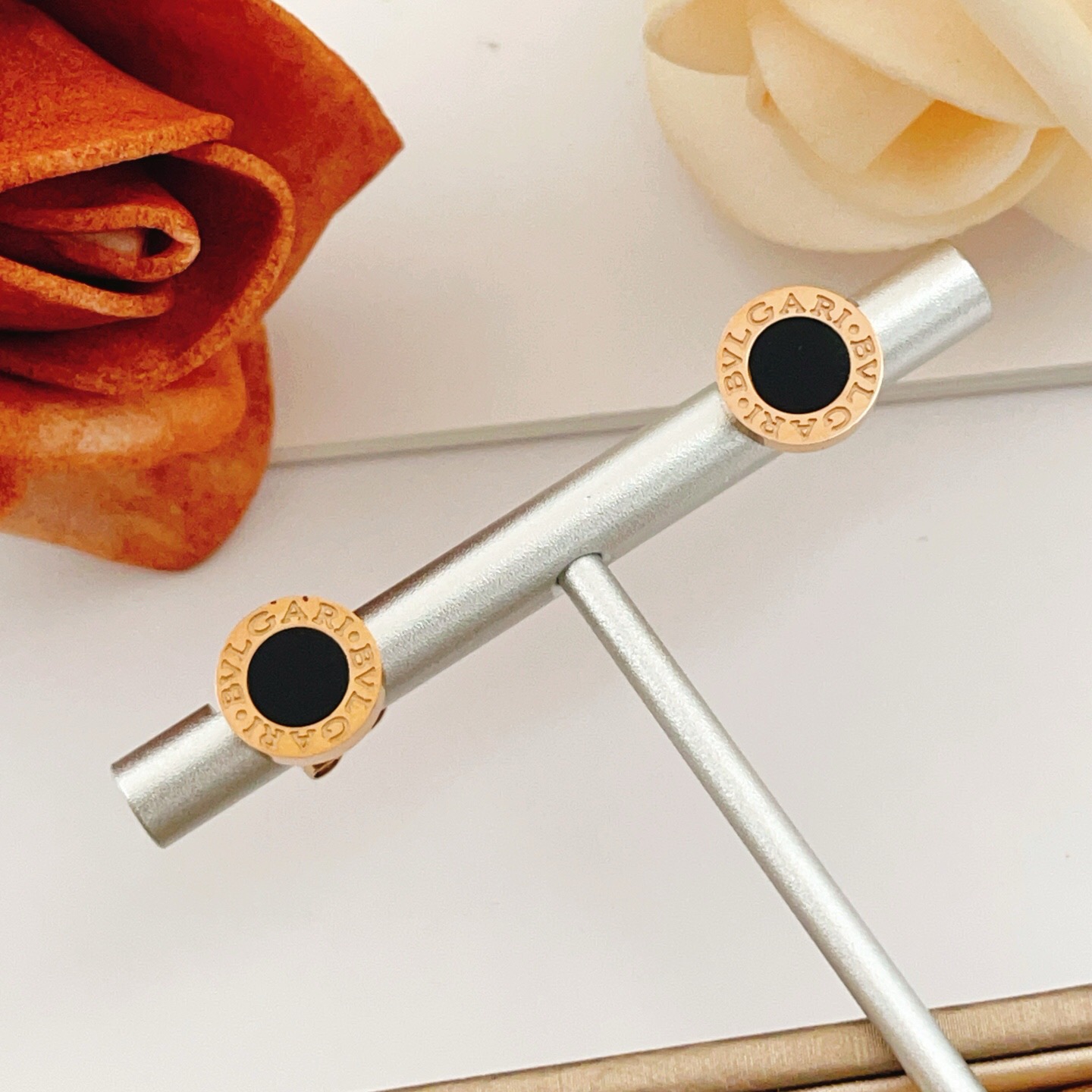 Bvlgari Bvlgari Bvlgari earrings rose gold metal with black onyx inlay 10mm diameter