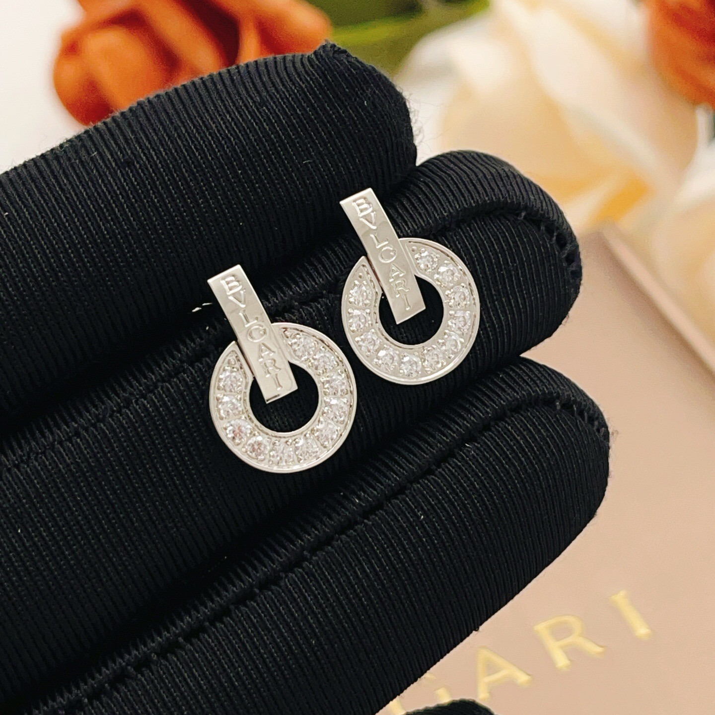 Bvlgari Bvlgari Bvlgari earrings silver-toned white gold with clear diamond accents 1 5cm diameter