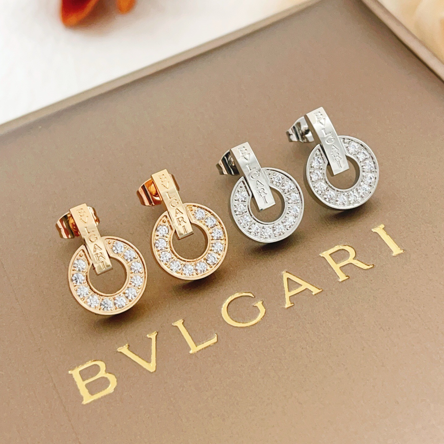 Bvlgari Bvlgari Bvlgari earrings silver-toned white gold with clear diamond accents 1 5cm diameter