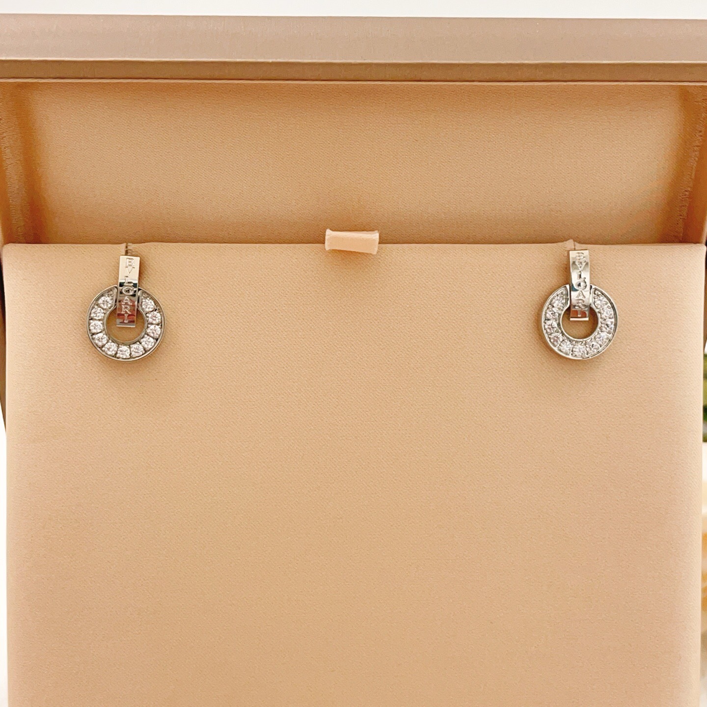 Bvlgari Bvlgari Bvlgari earrings silver-toned white gold with clear diamond accents 1 5cm diameter