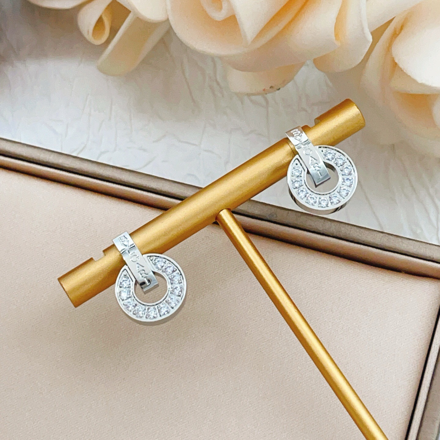 Bvlgari Bvlgari Bvlgari earrings silver-toned white gold with clear diamond accents 1 5cm diameter