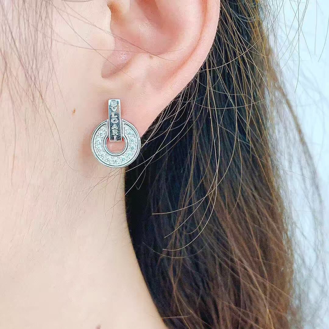 Bvlgari Bvlgari Bvlgari earrings silver-toned white gold with clear diamond accents 1 5cm diameter