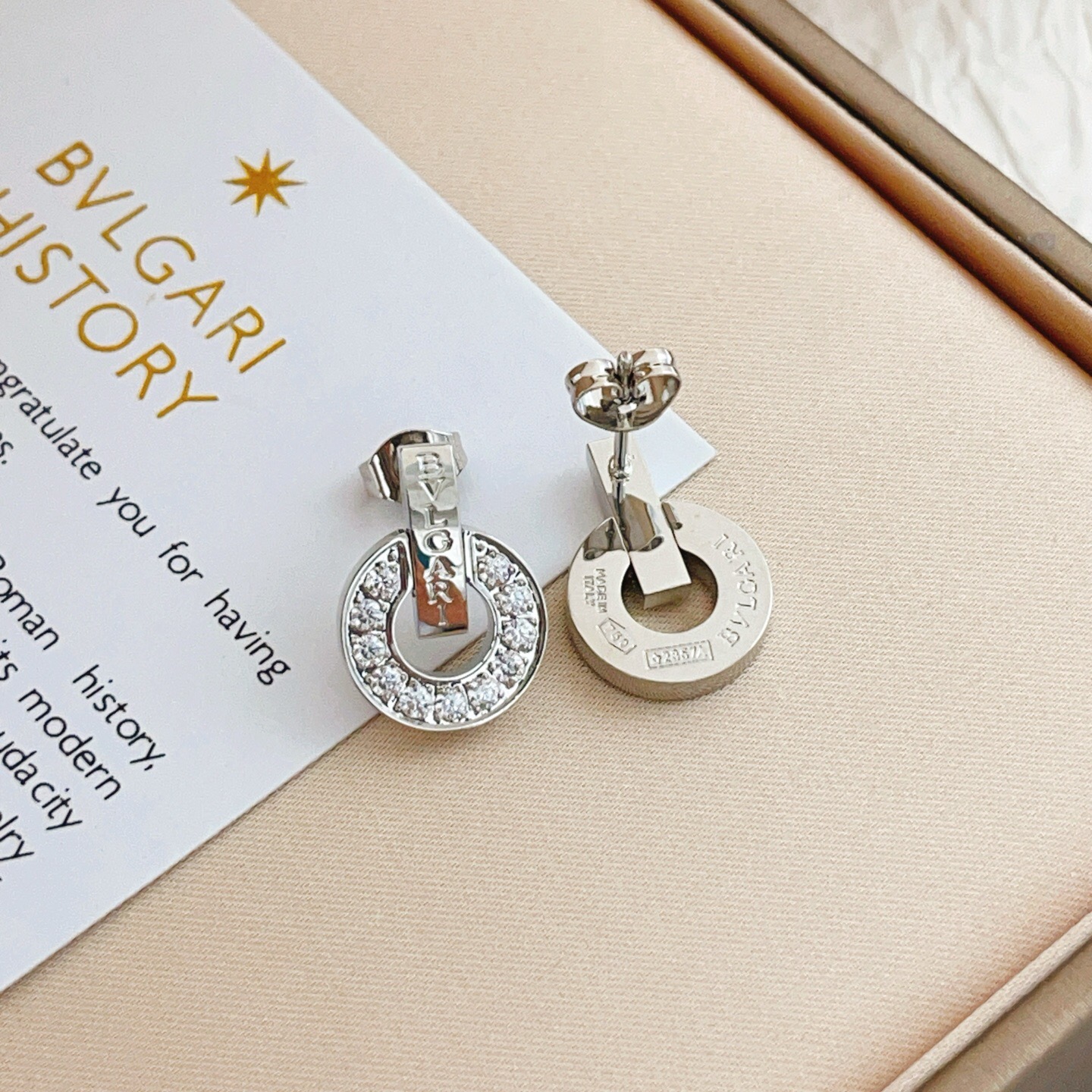 Bvlgari Bvlgari Bvlgari earrings silver-toned white gold with clear diamond accents 1 5cm diameter