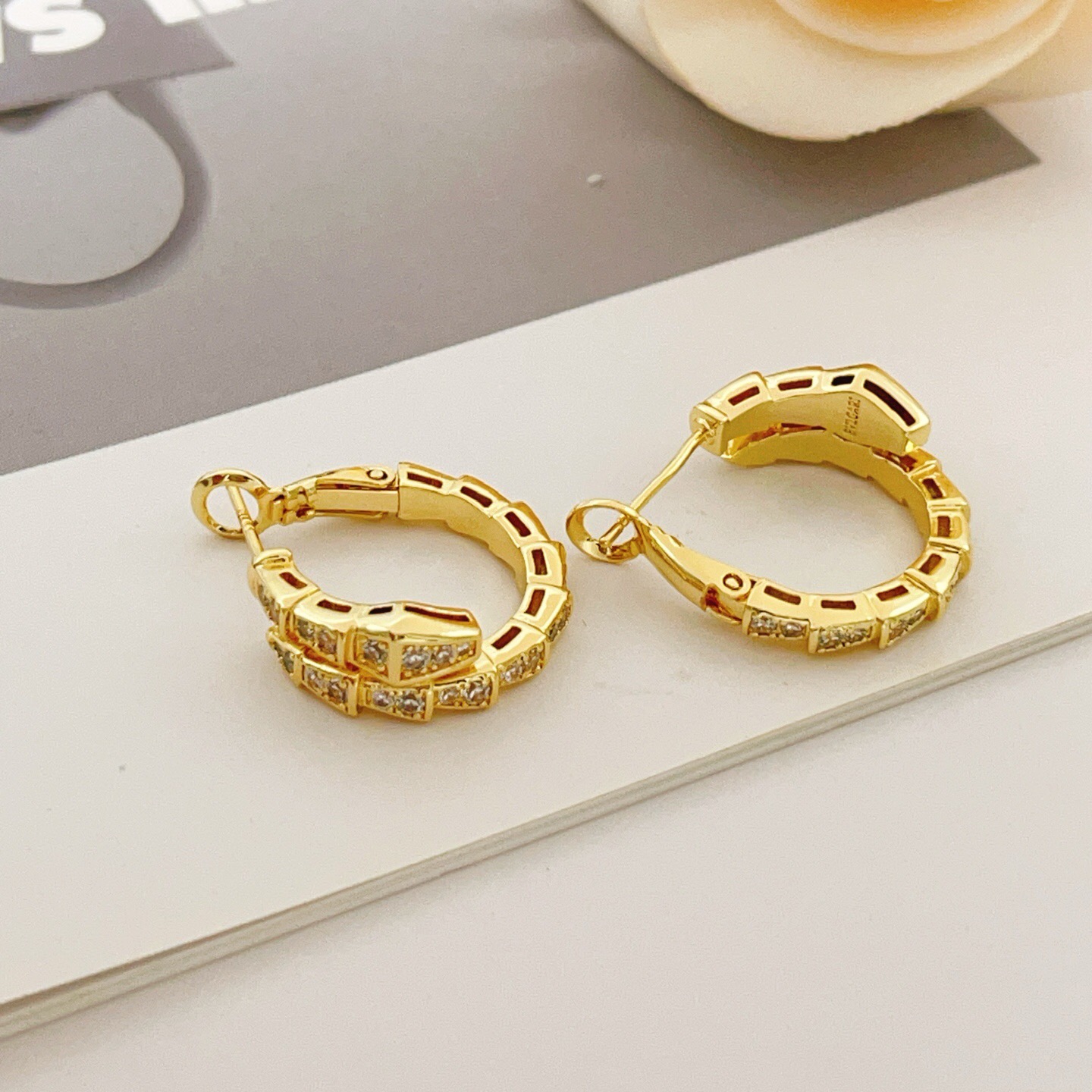 Bvlgari Serpenti Viper earrings yellow gold with clear pave diamonds 15mm outer diameter