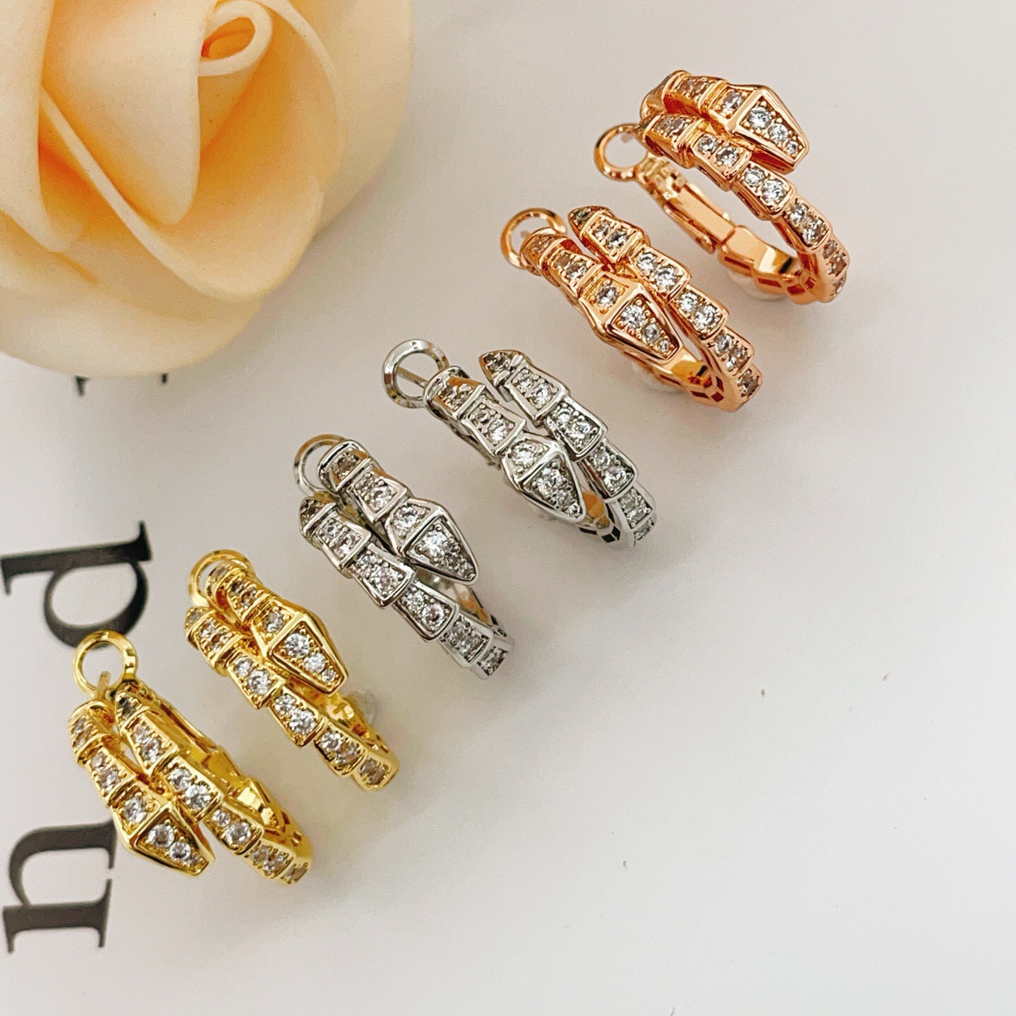 Bvlgari Serpenti Viper earrings yellow gold with clear pave diamonds 15mm outer diameter
