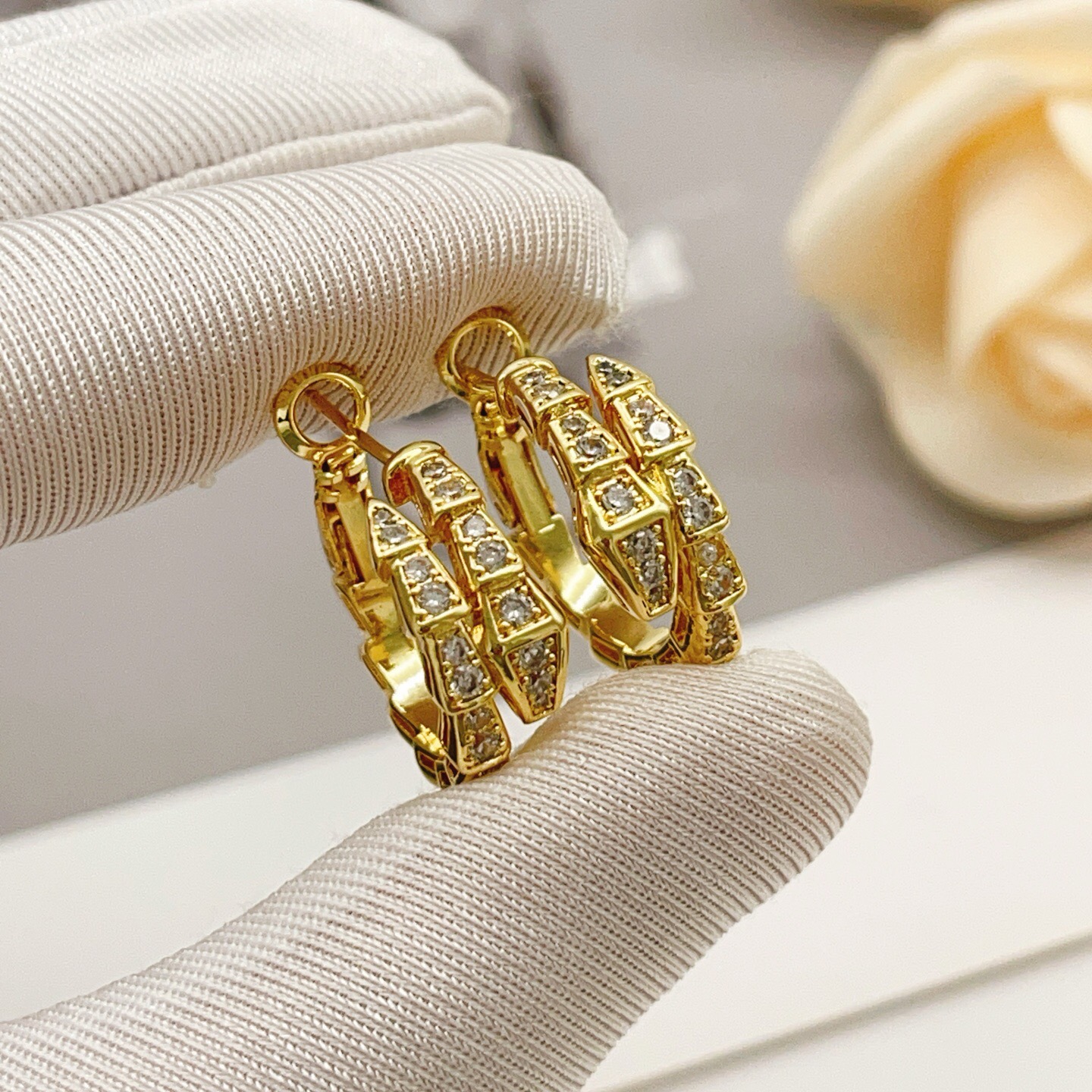 Bvlgari Serpenti Viper earrings yellow gold with clear pave diamonds 15mm outer diameter