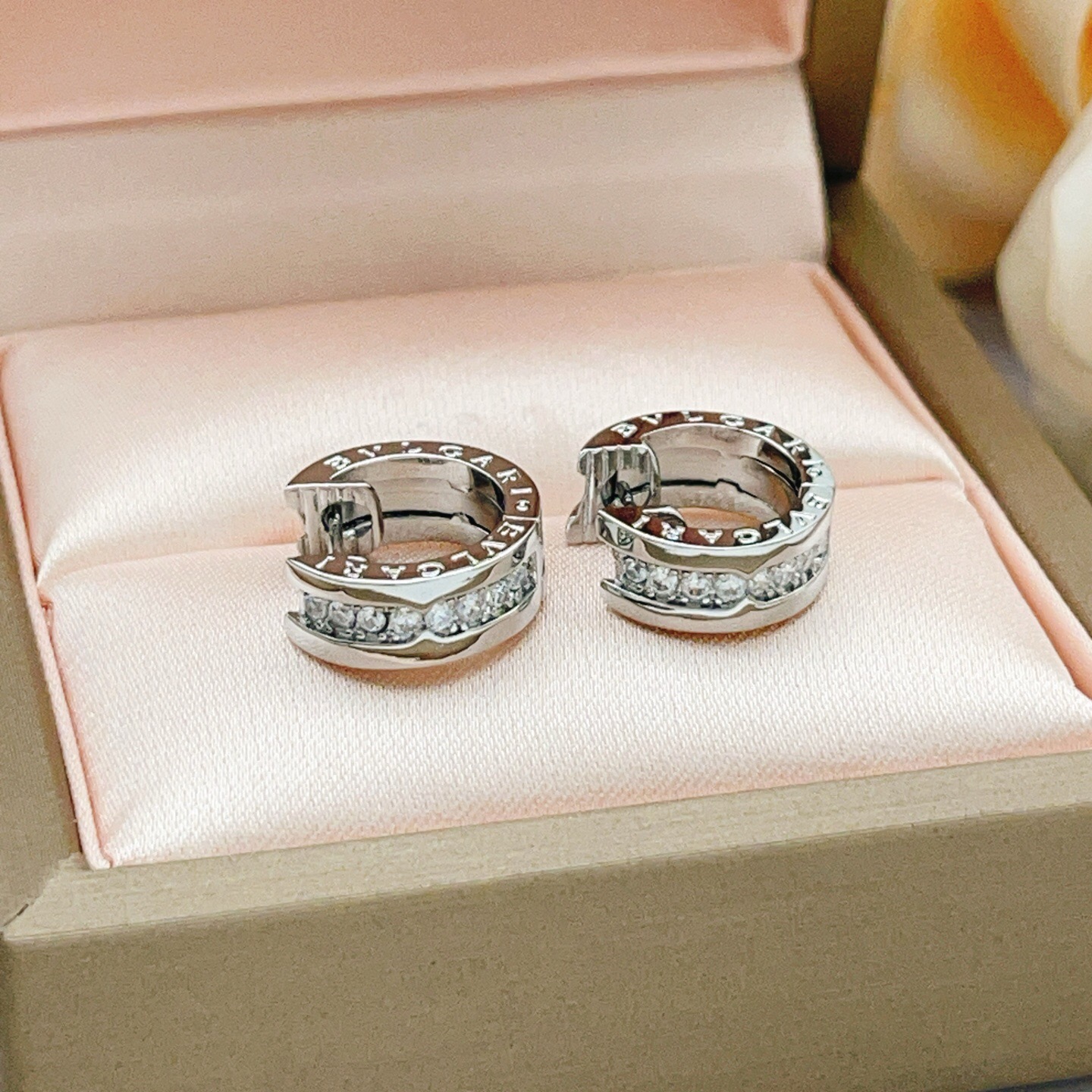 Bvlgari B zero1 earrings silver-toned white gold with clear pave diamonds 10mm outer diameter