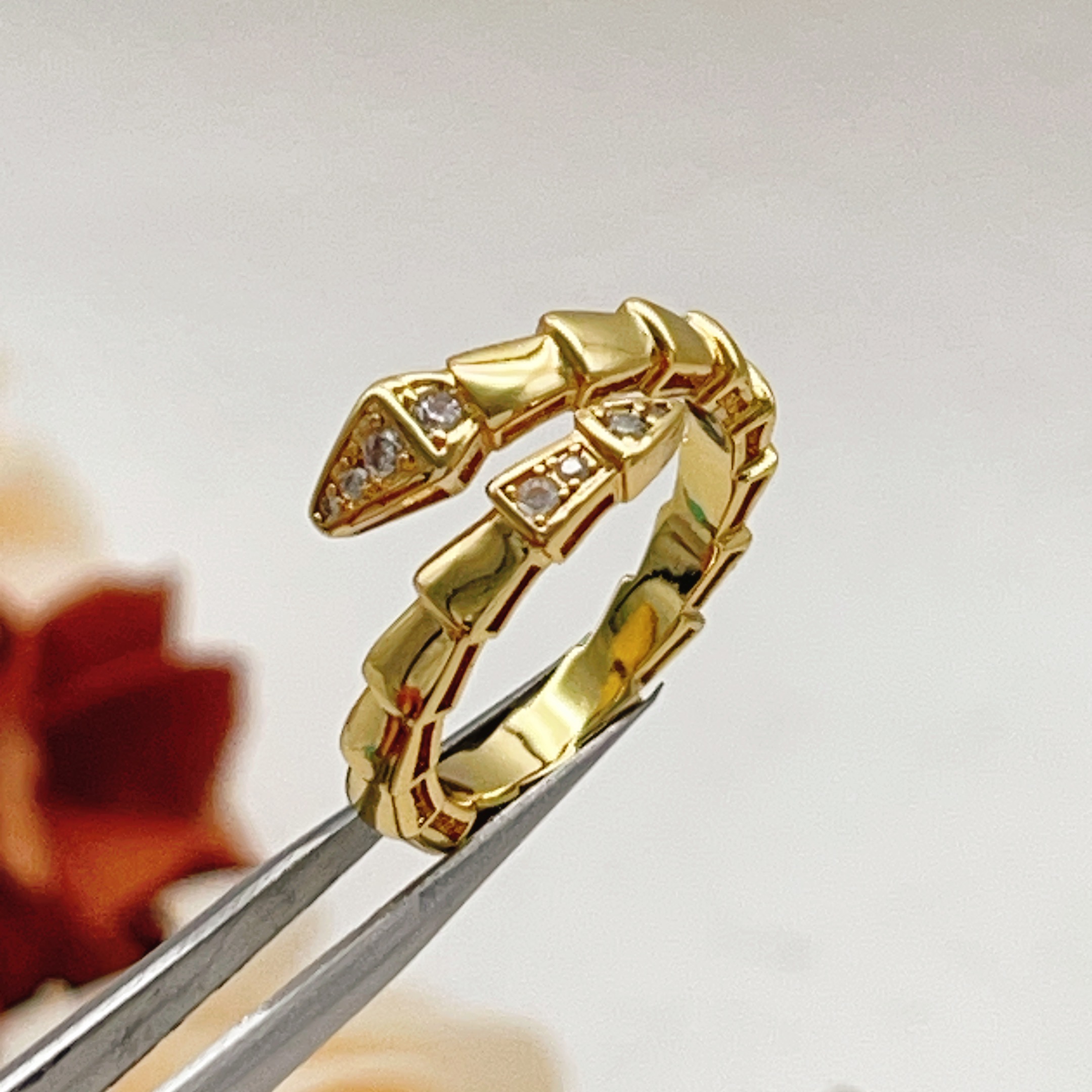Bvlgari Serpenti Viper ring Yellow gold with clear diamond accents and dark red enamel detailing One size fits all