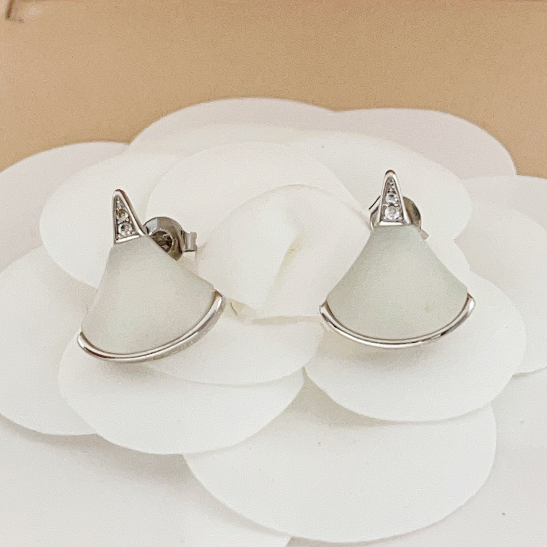 Bvlgari Divas Dream earrings silver-toned metal with white mother-of-pearl and clear diamond accents 1 2cm stud length