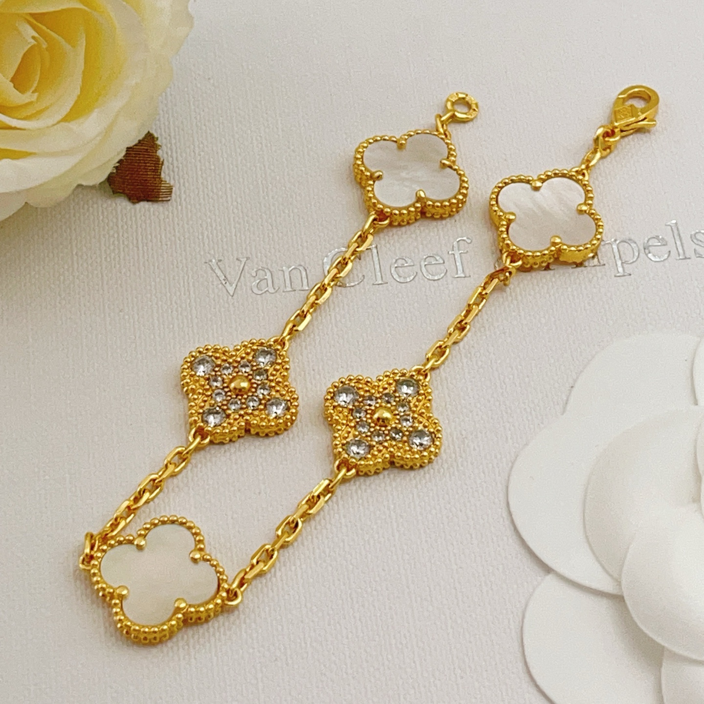 Van Cleef Arpels Vintage Alhambra bracelet Yellow gold with white mother-of-pearl and clear diamond accents 18cm